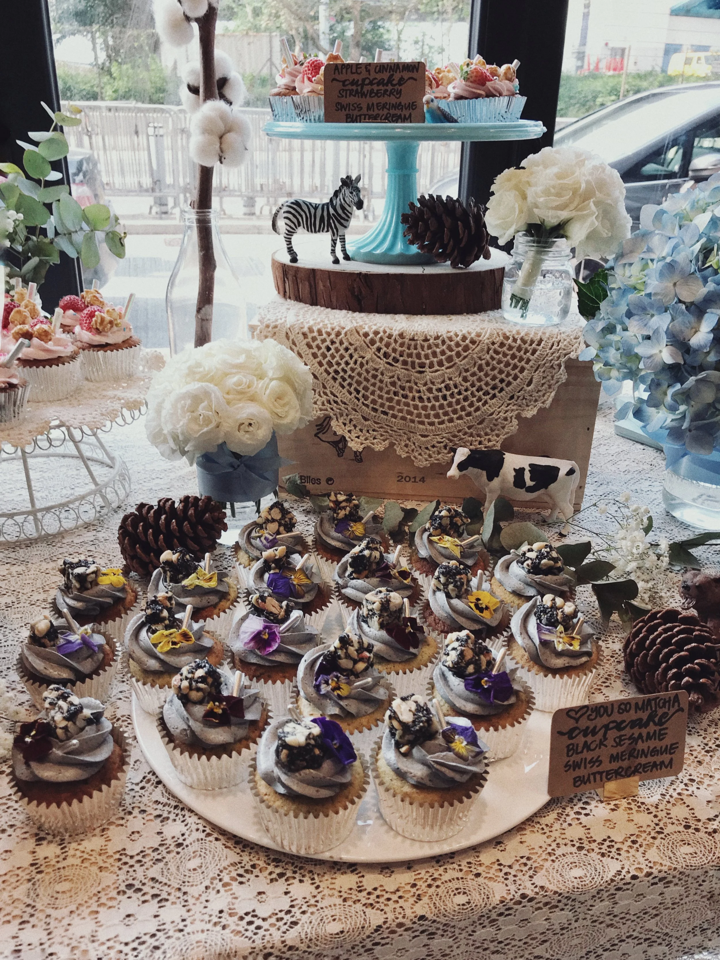 Matcha cupcake topped with Black sesame Swiss meringue buttercream
