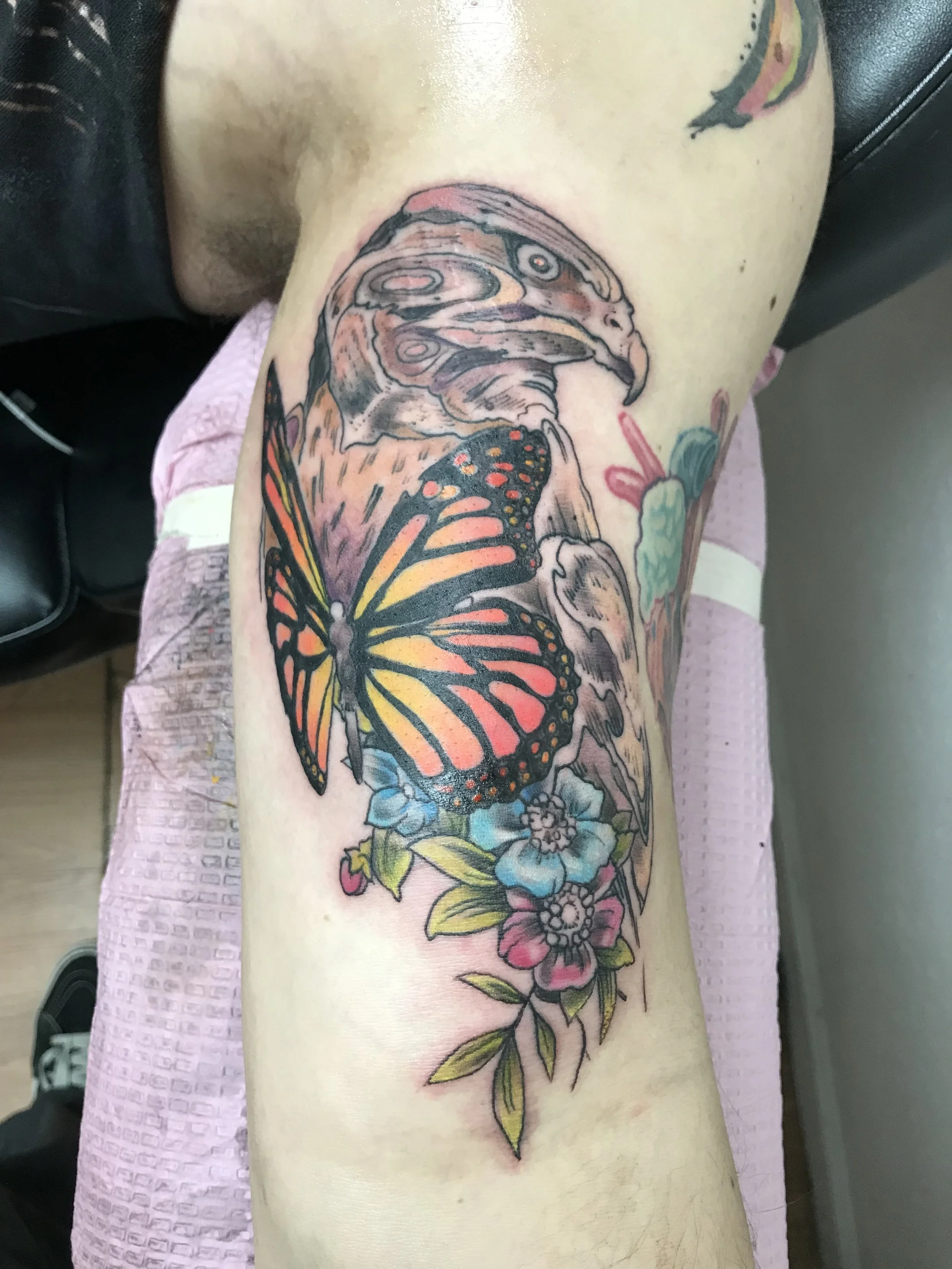Wooden hawk + monarch + wildflowers