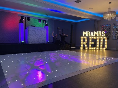 MR & MRS Moorhouse LED letters at a wedding
