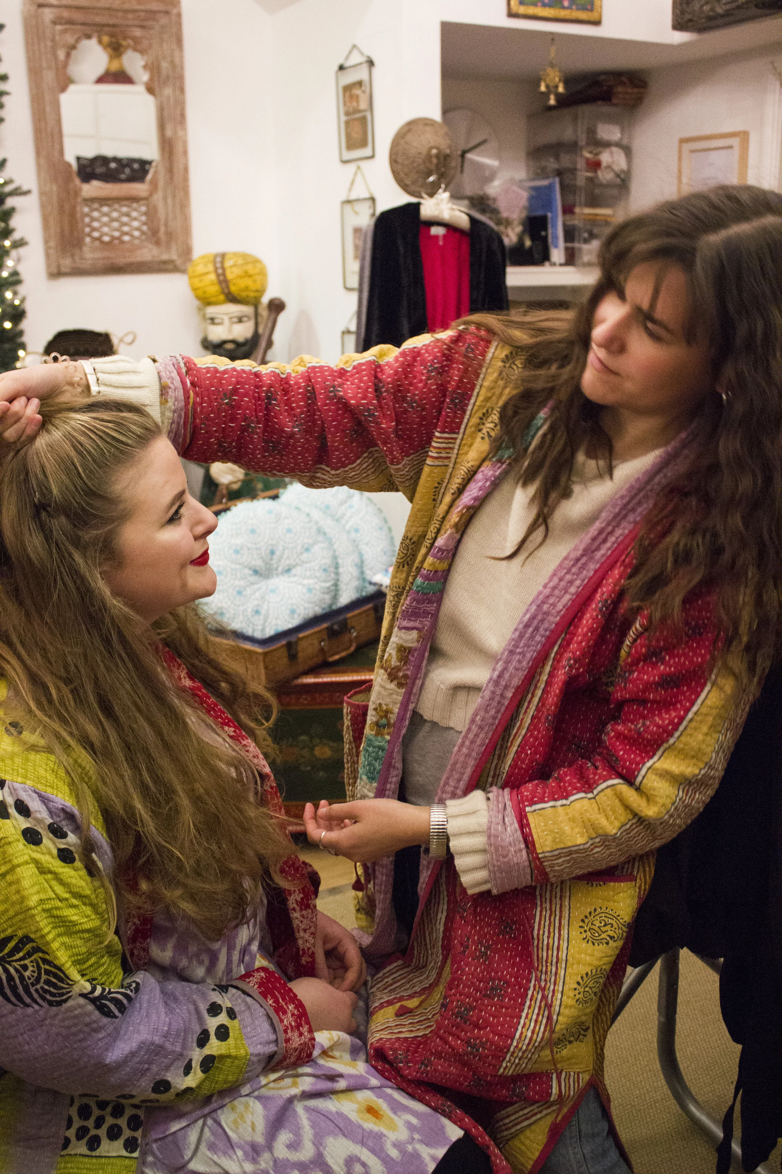 Katherine helps Lana with her hair before the show