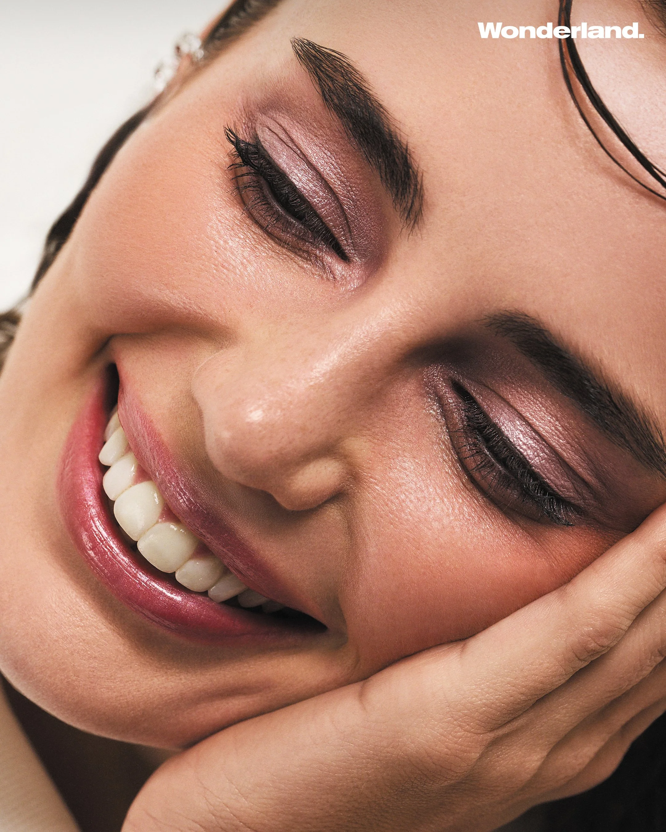   This makeup look on Rebecca Donaldson features a flawless base that enhances the natural complexion, achieved through a lightweight foundation and a subtle concealer to cover imperfections. The eyes are the focal point, adorned with soft, smoky hue