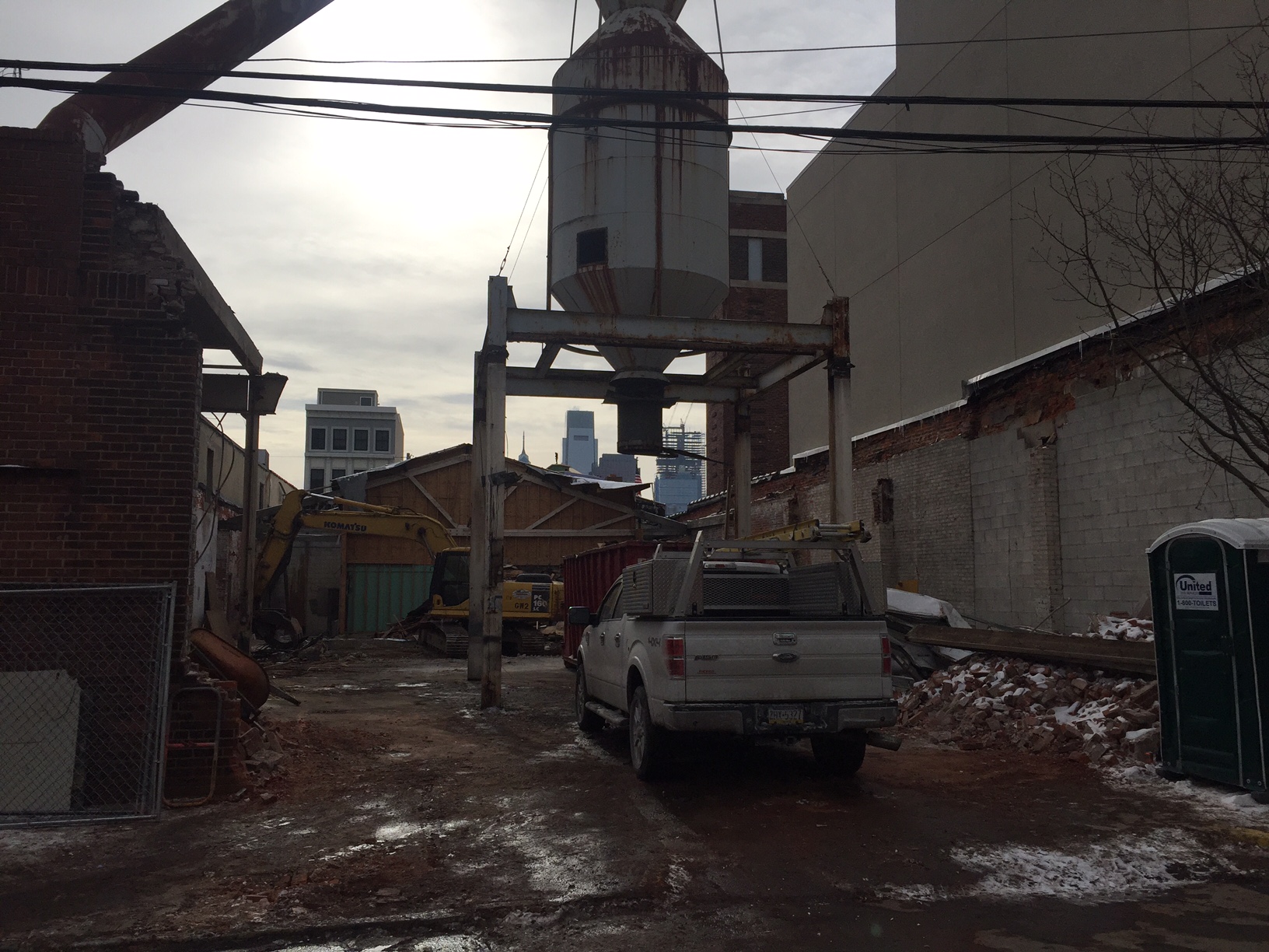 Rear view shows it's mostly gone, and what was that huge metal container used for?