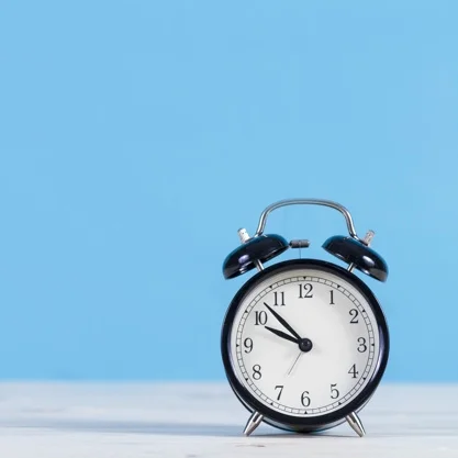decorative-alarm-clock-with-blue-background_23-2147609624.jpg