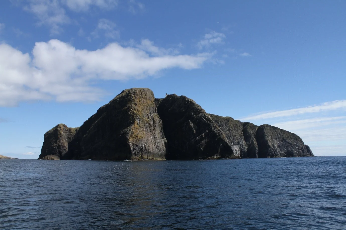 Sailing past Barra Head