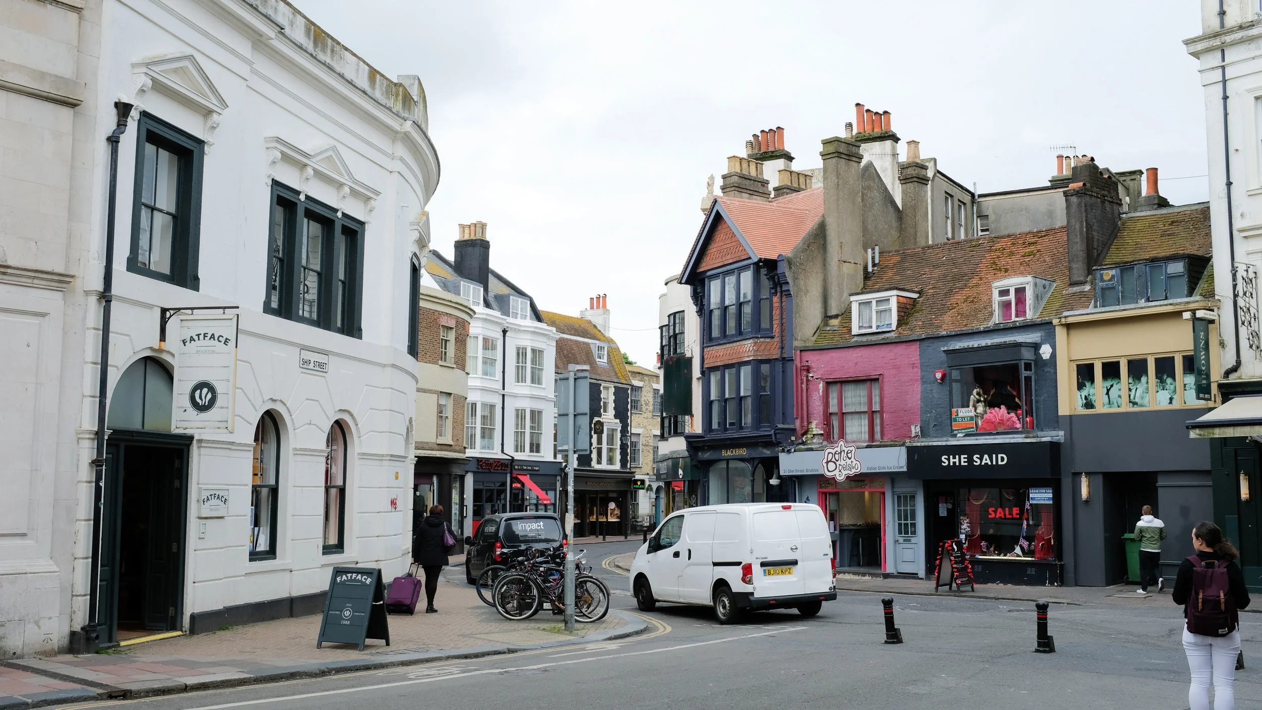 The streets were small and narrow, winding around these funny looking houses lined up closely to each other. The people matched the buildings too. The atmosphere of the city felt chill and creative. Like a cooler Coney Island.