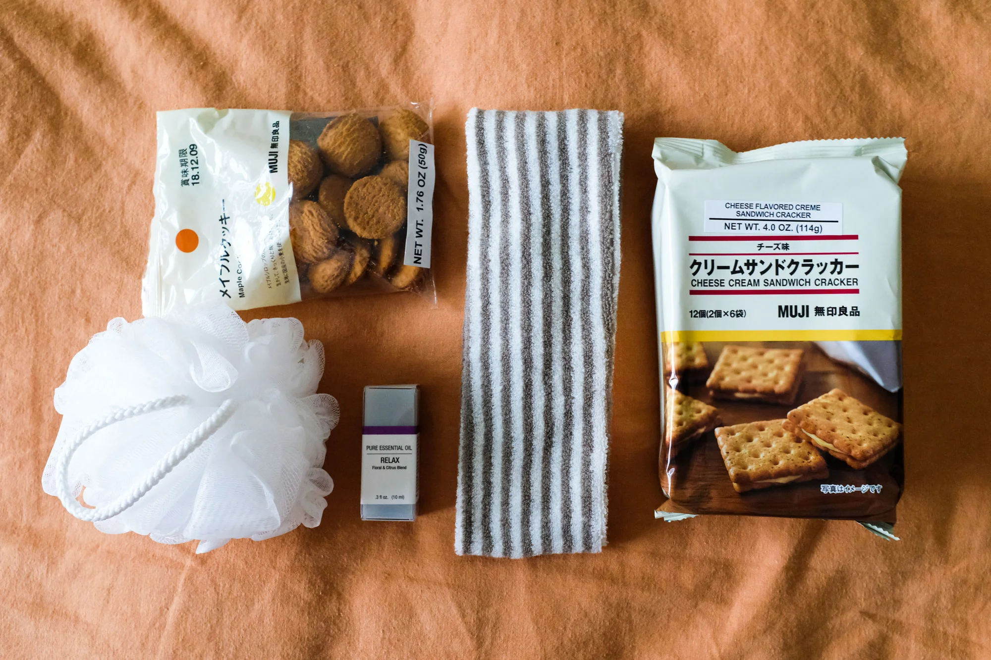 My latest Muji online purchase. The relax oil for my diffuser smells great. I sometimes turn the diffuser on before I go to sleep as part of a night routine to wind down. I use the striped headband to wash my face. It’s so soft, I forget it’s on my head. The crackers and cookies were good and the loofah is pretty soft.