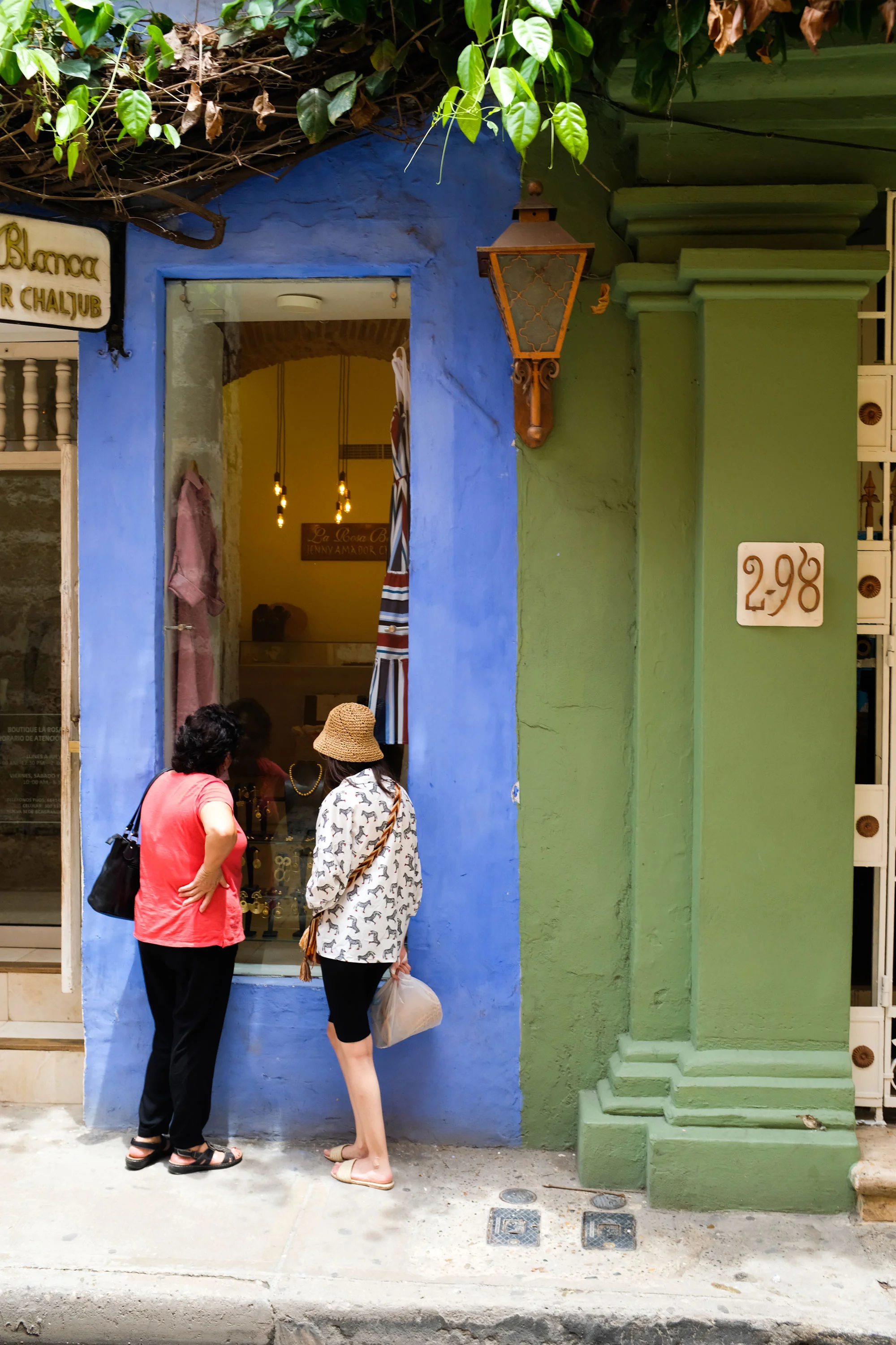 Mom and sis looking inside a shop with, coincidently, my grandma’s name.