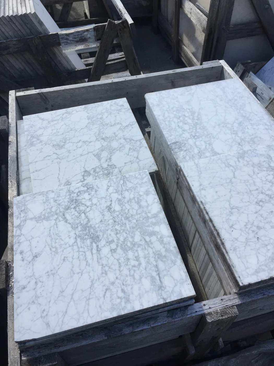 400x400x12mm honed carrara tiles @ €50/sqm