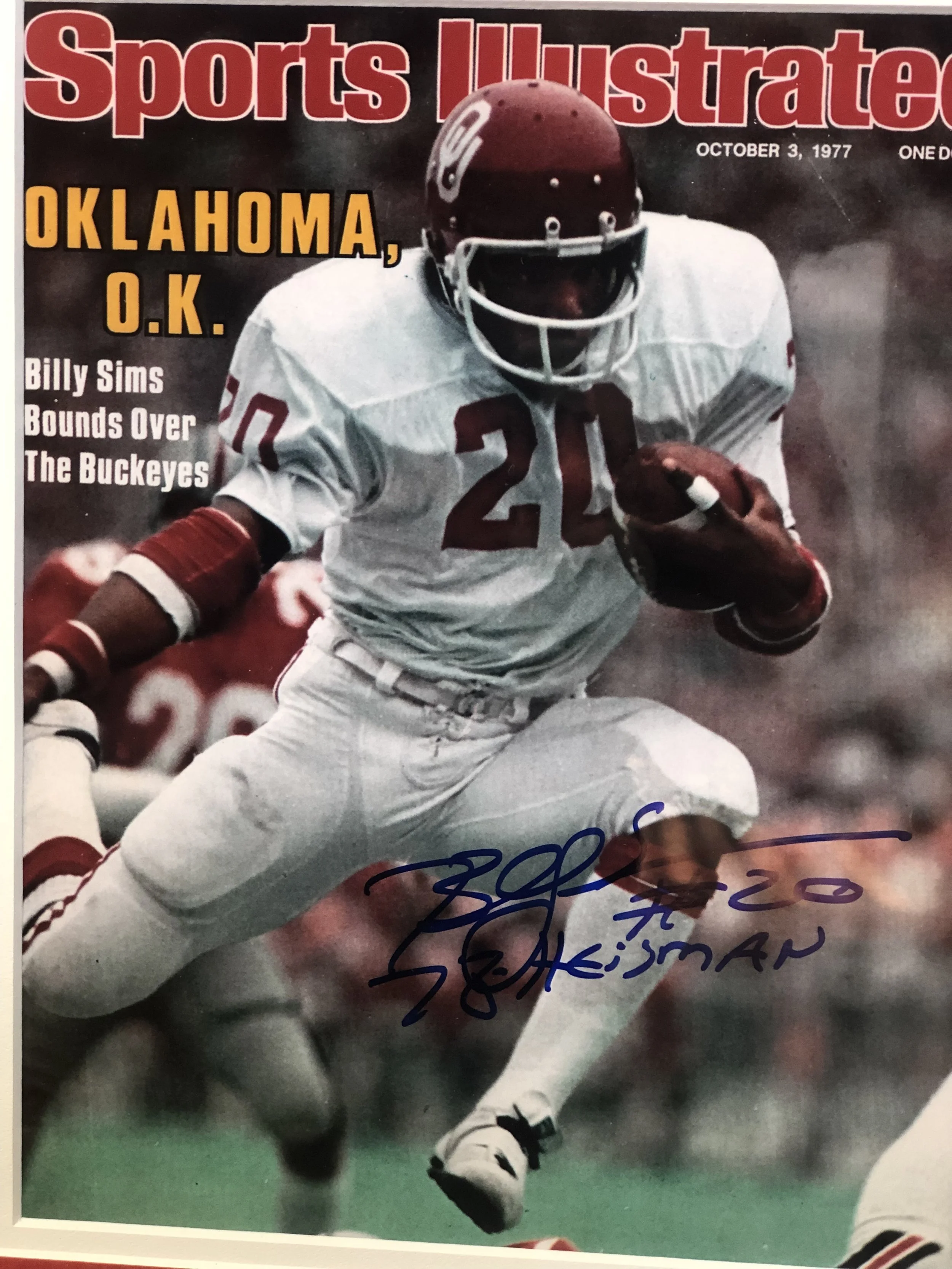 Score a touch down with an autographed framed photo of Billy Sims