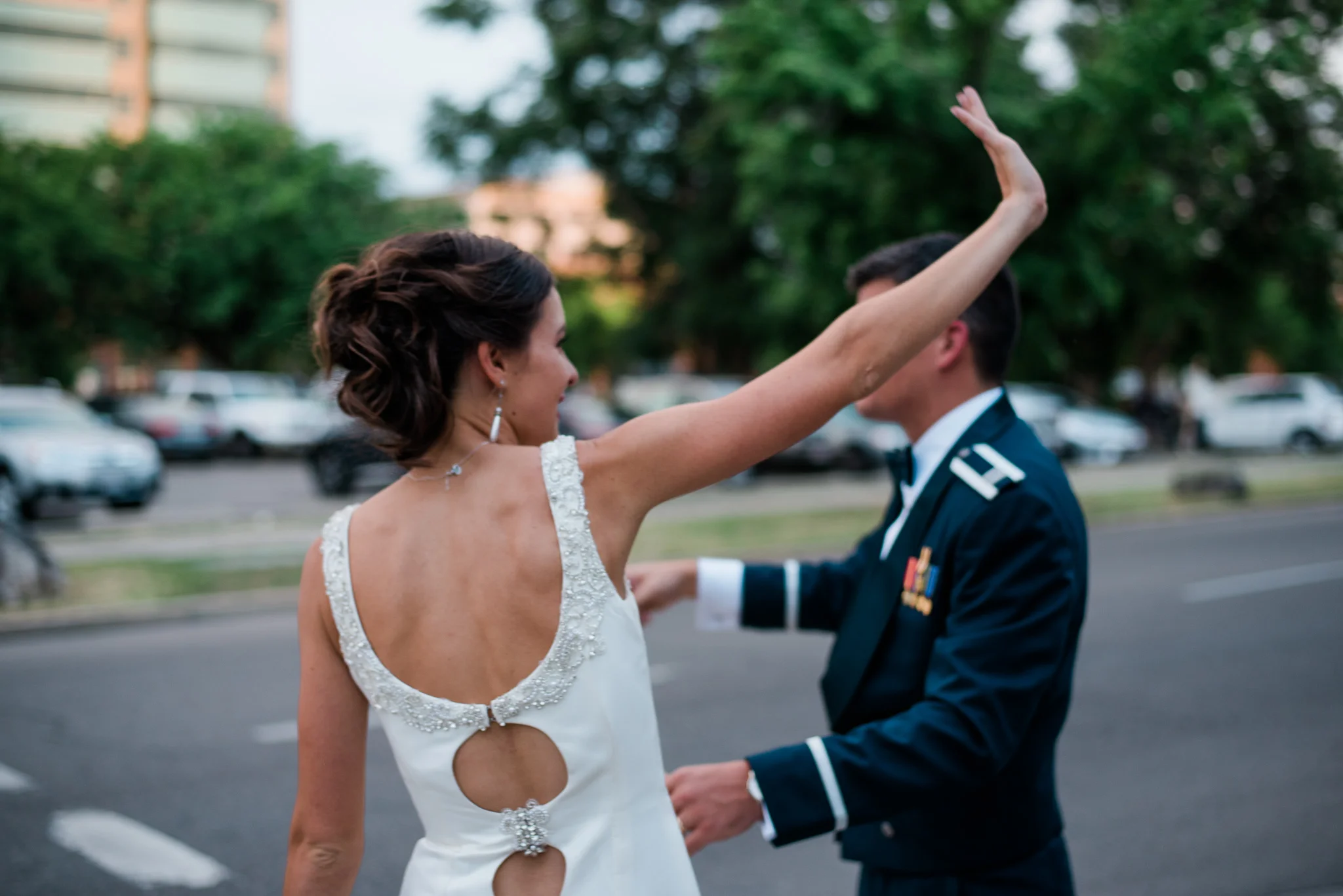 Boise Wedding Photographer // Idaho engagement photographer // PNW Engagement // Wedding // Idaho bride // Natural Couples Posing Ideas // wedding exit // tunnel exit // air force wedding // elegant wedding dress // open back wedding dress // boise basque center // catholic wedding // party reception // wedding reception dancing // simple wedding ideas // getting ready wedding // inn at 500 boise // boise couples photographer // SS Photography & Design // Sadie Shirts