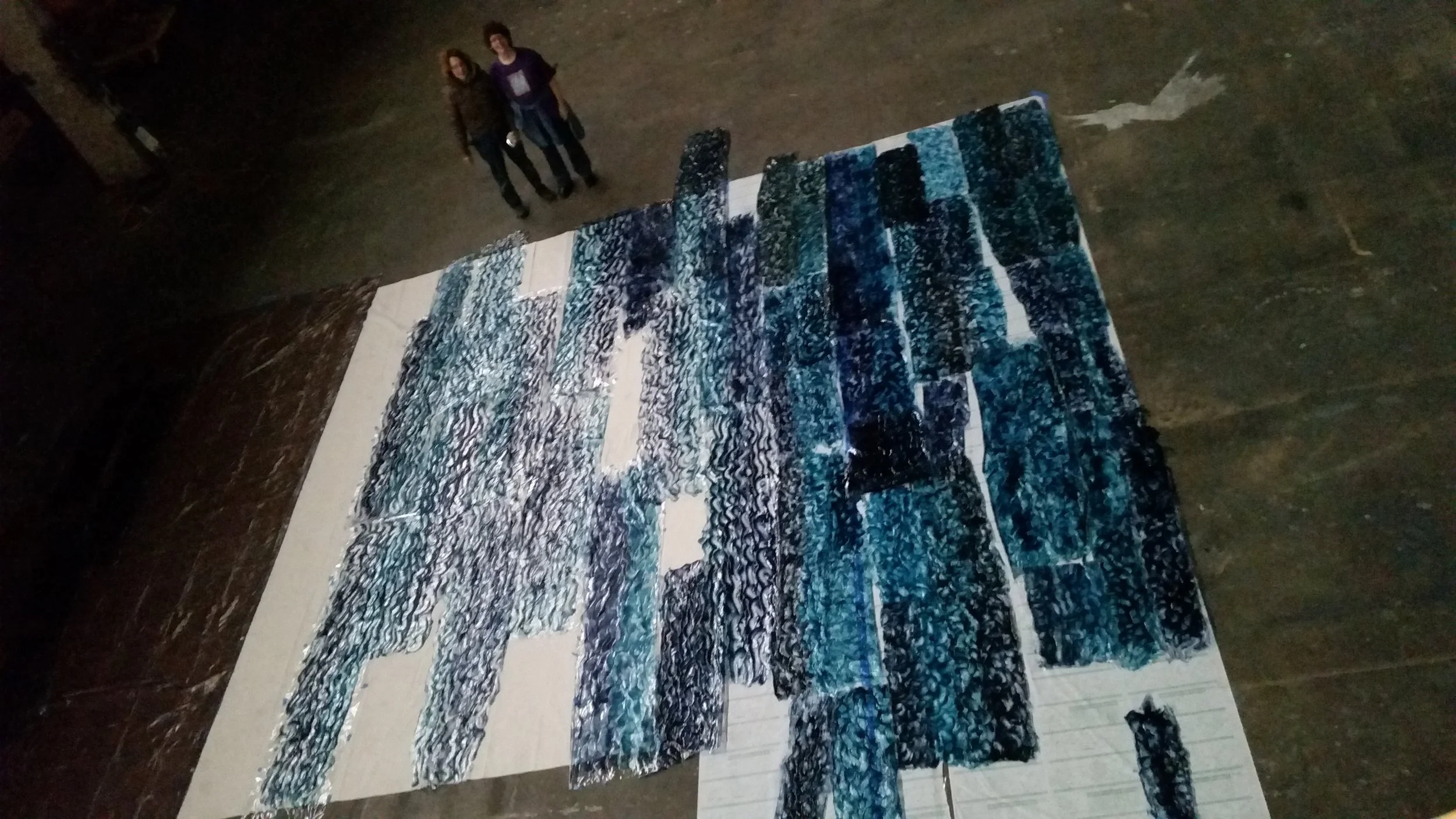 Assembling many textured pieces together to make an entire ocean. Photograph by Kathleen Chamberlin