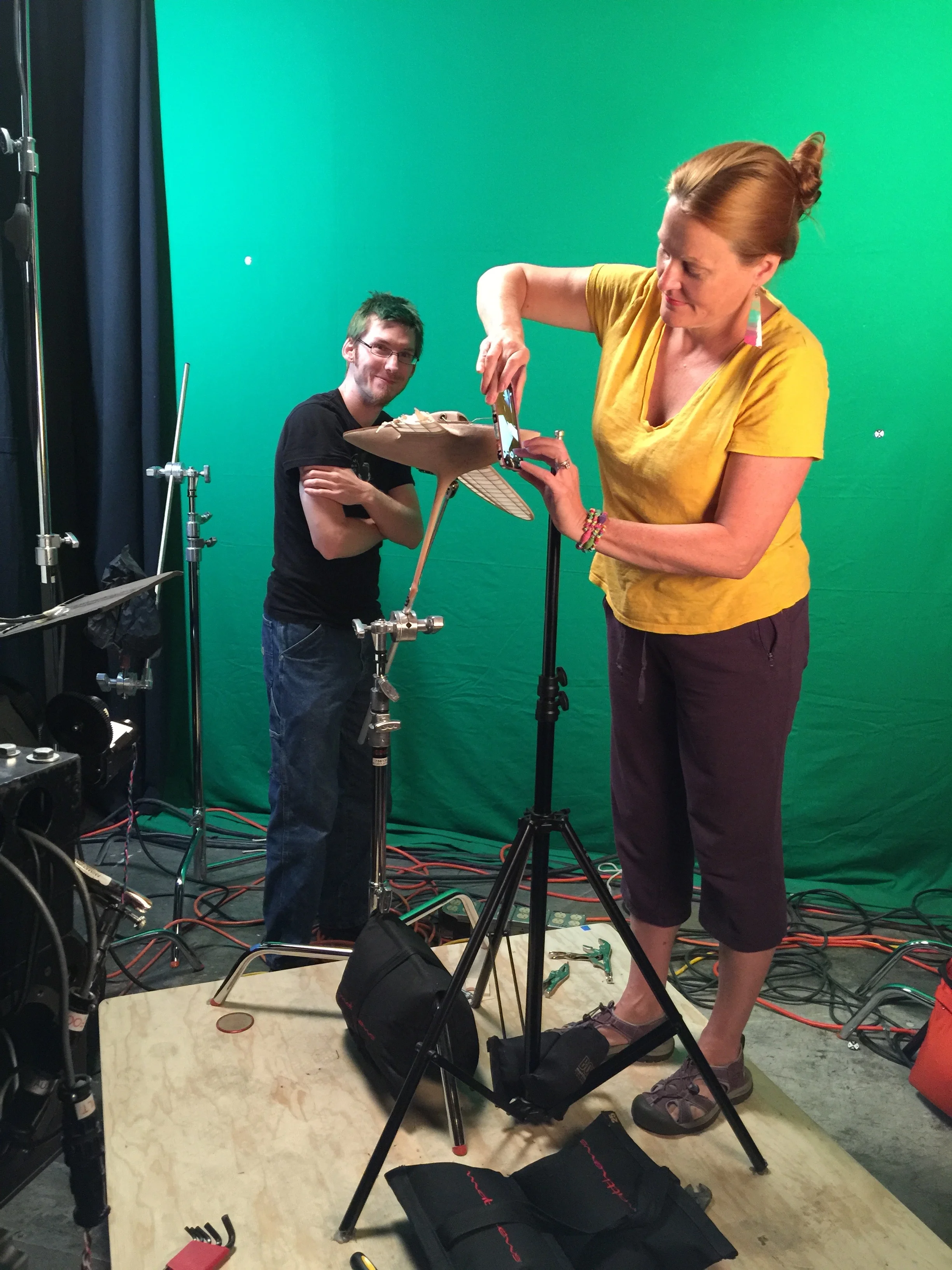 Animator Javan Ivey pauses so Art Director Kathleen Chamberlin can take a photograph. Photograph by Beth Gavigan