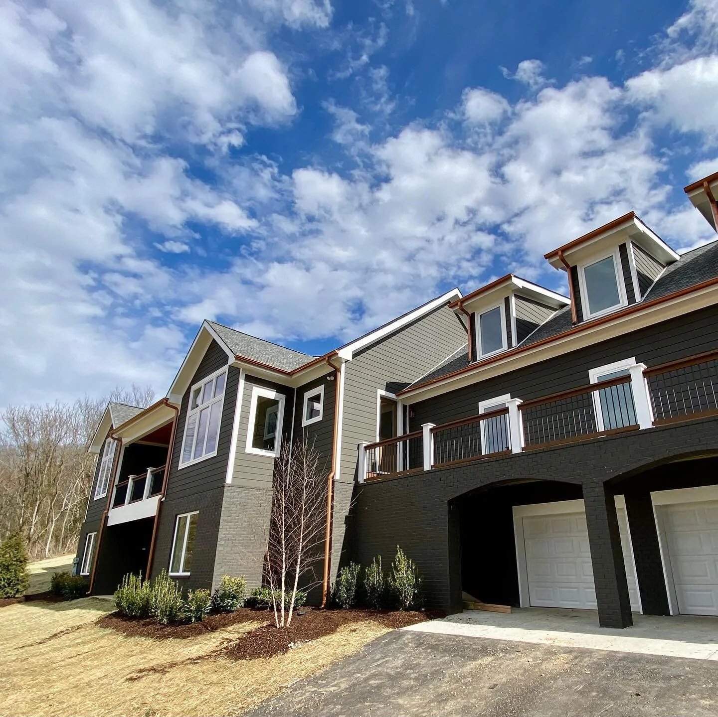 ✨Spring is officially here! How good does the copper finishes contrast on this beautiful home we just finished?!✨
