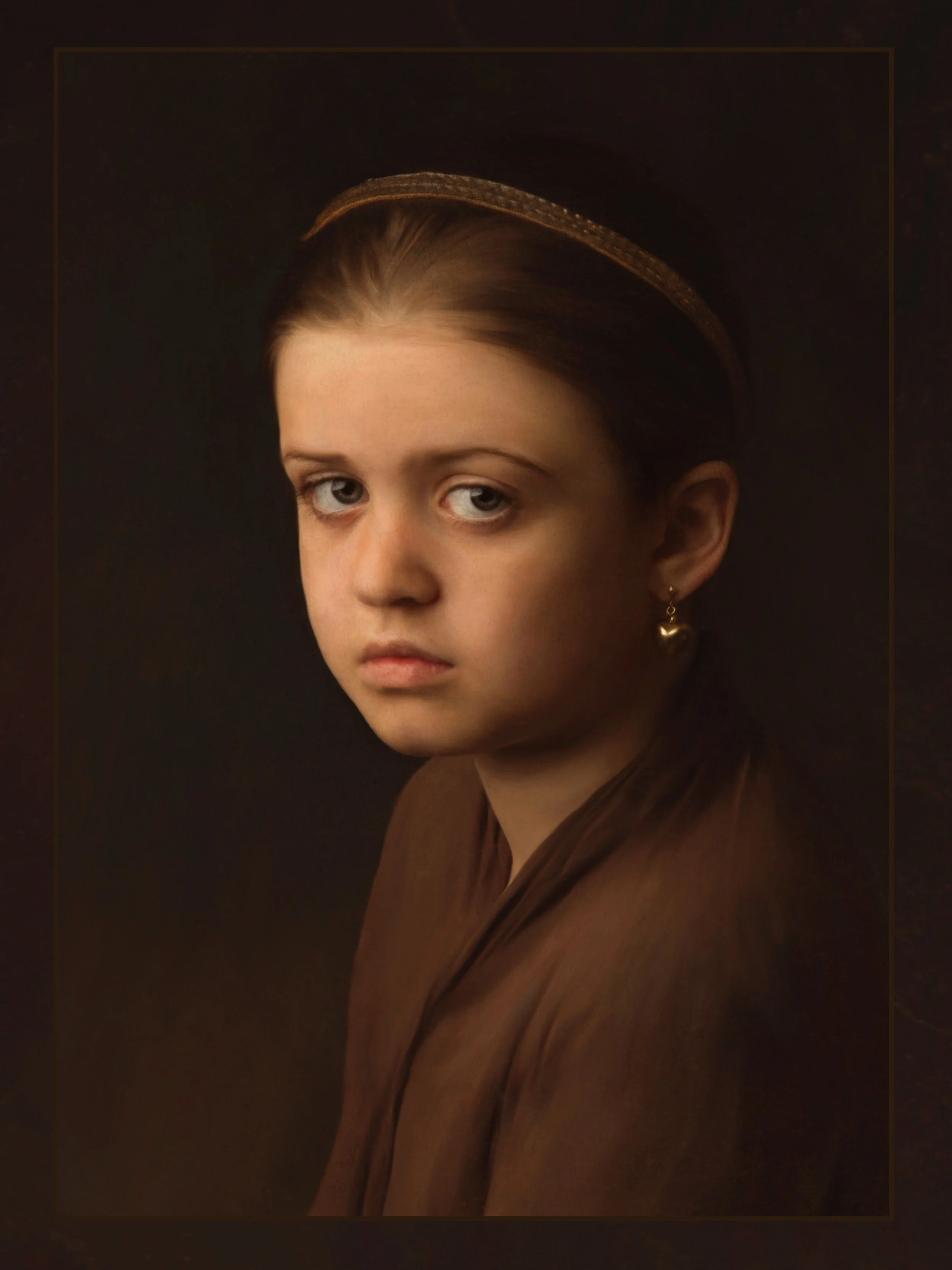 Girl with a heart earring.jpg