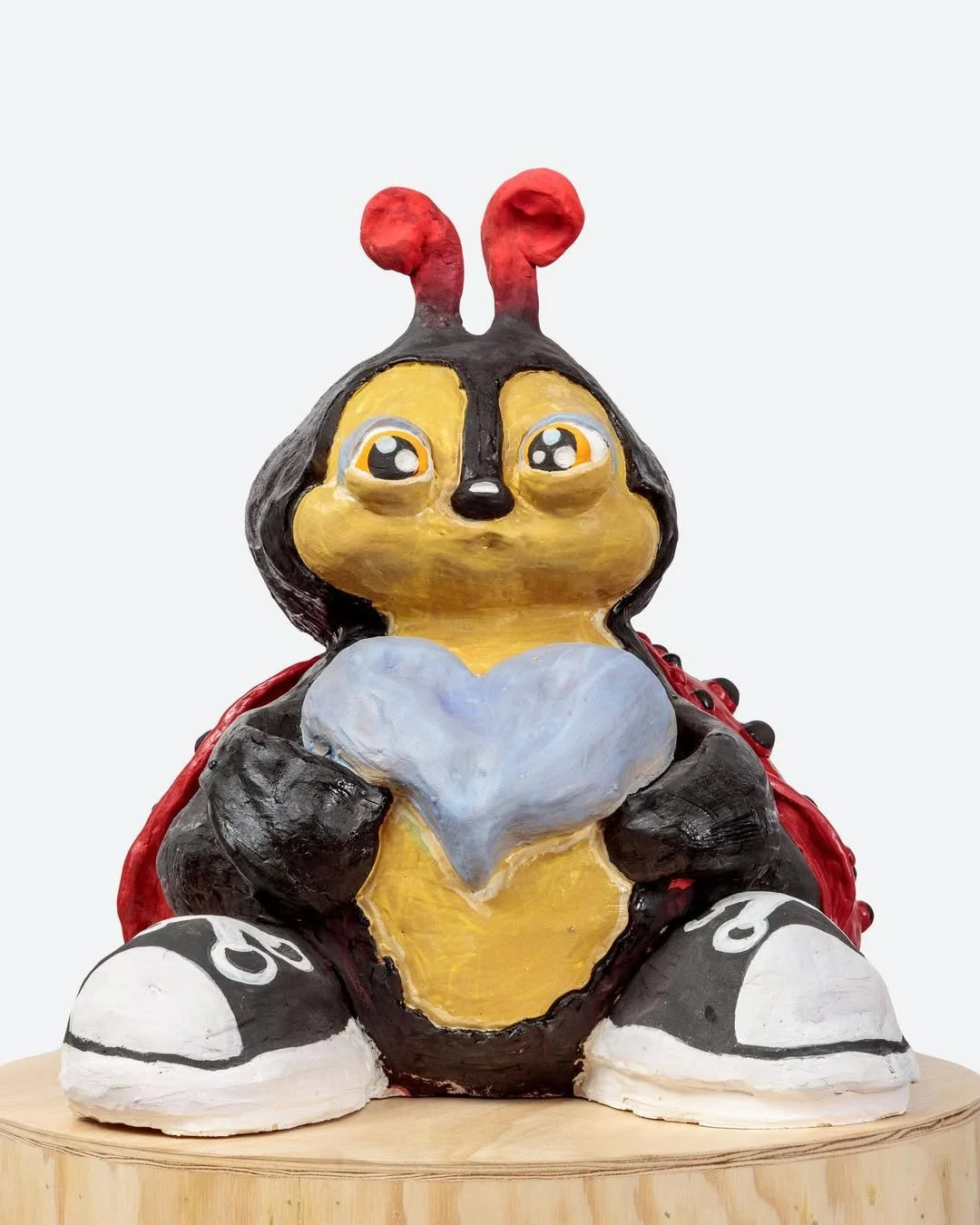 A Bugs Life 🍃 Tender Lady Bug holding a Heart as Big as it’s Sneakers @jeffreydeitchgallery On .jpg