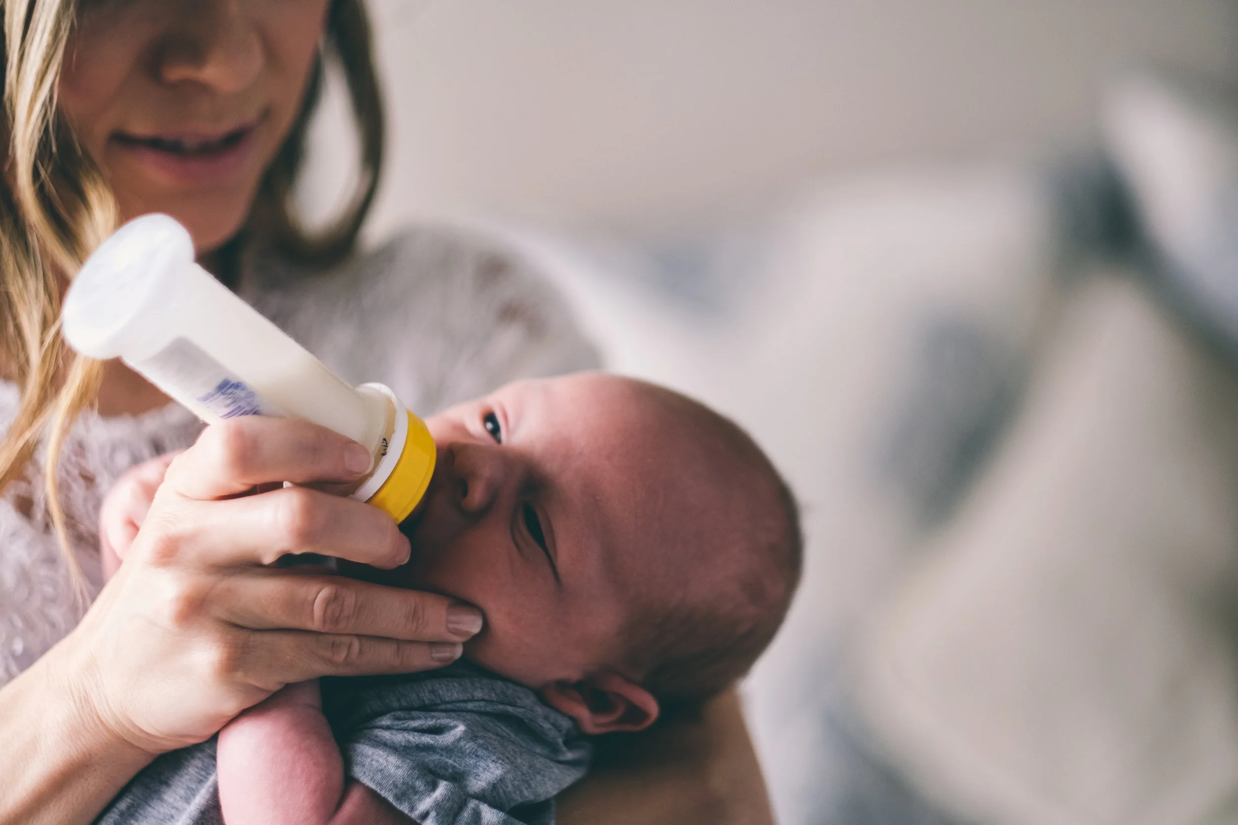 bottle feeding baby.jpg