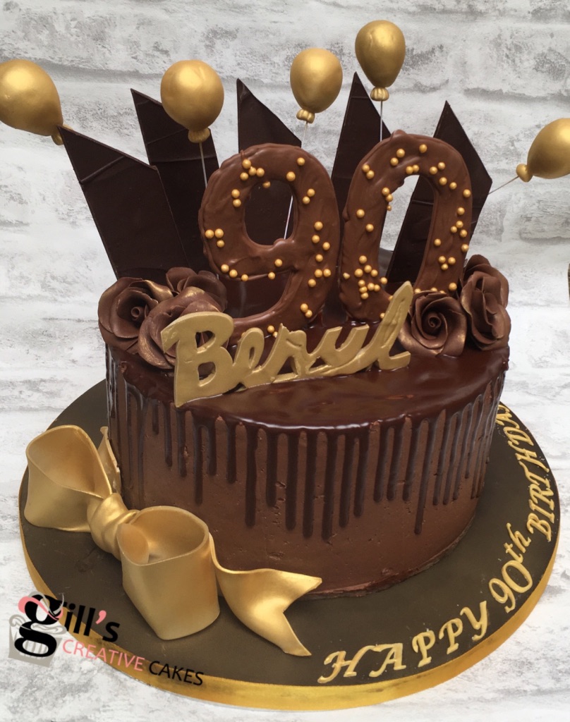 90th bithday chocolate drip cake with bow .jpg