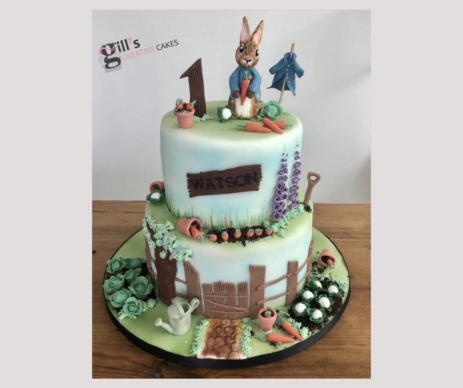 1st Birthday 2 tier Peter Rabbit inspired cake.png