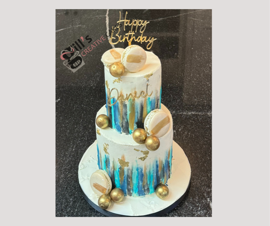 Contemporary two tier blue and gold wedding cake 