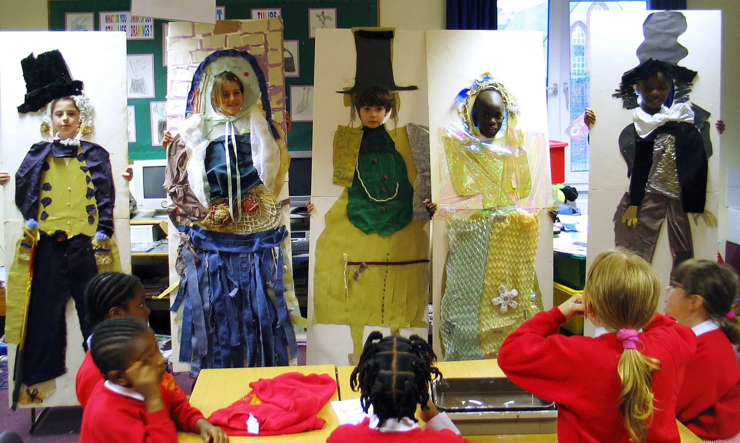 We used fabric scraps to make characters in costume.