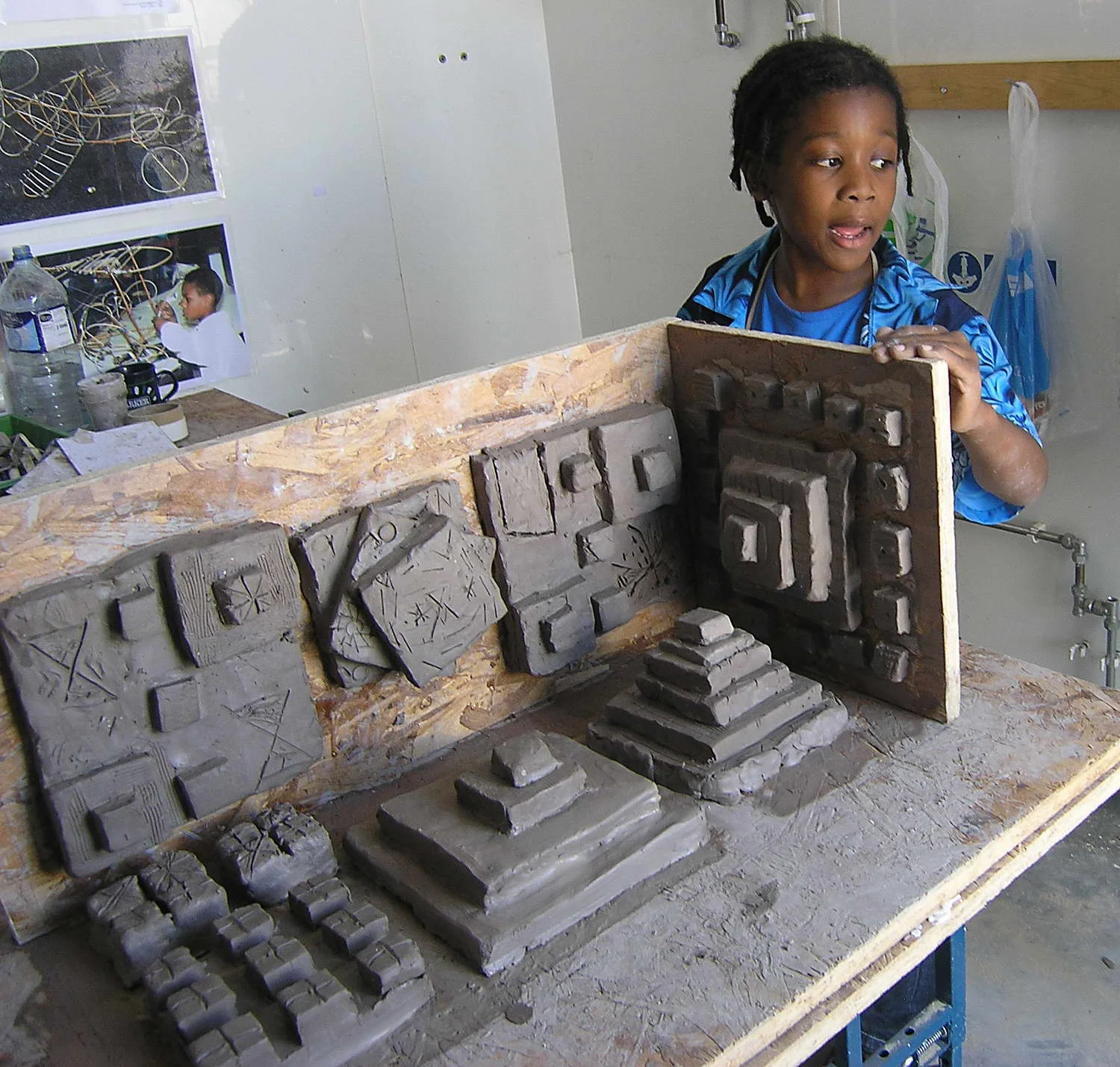  Preparing a mould using various clay squares. 