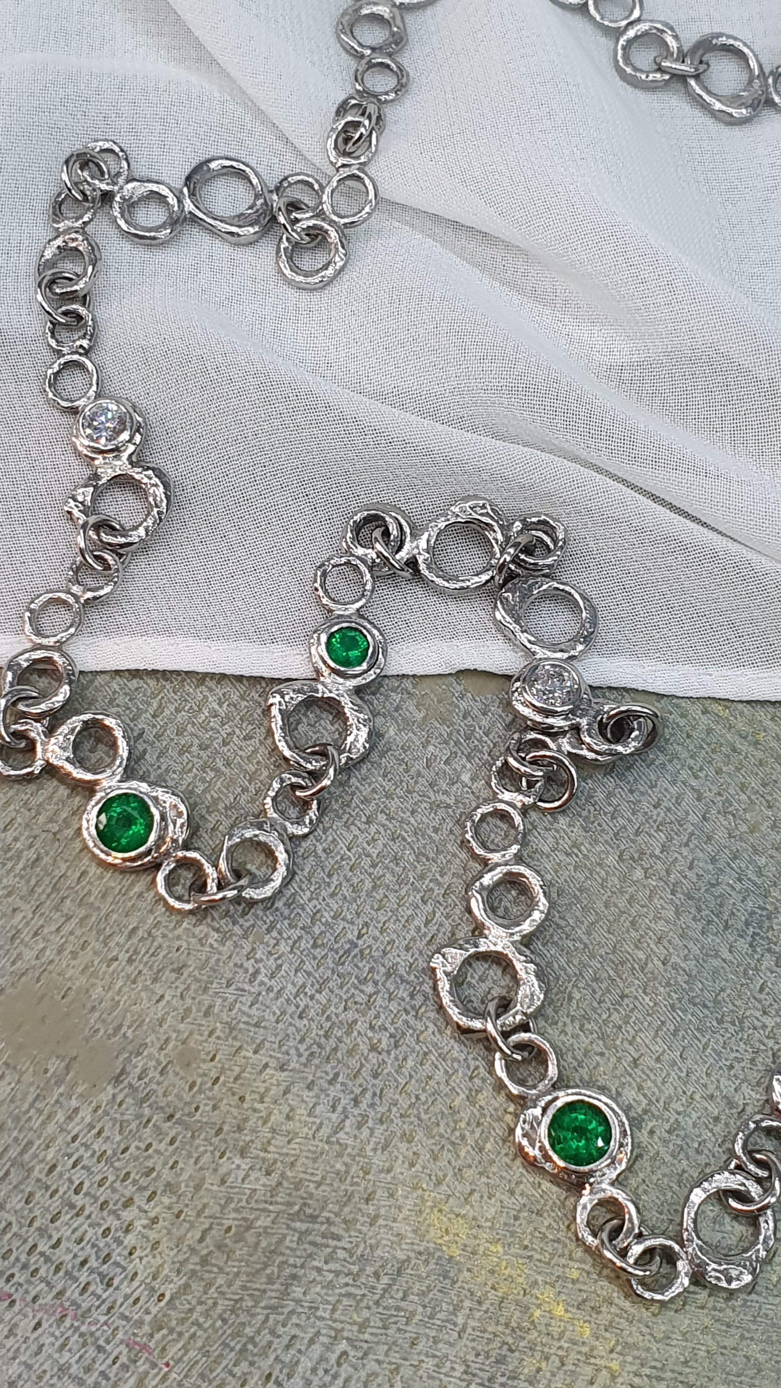 Platinum, emerald and diamond necklace commission