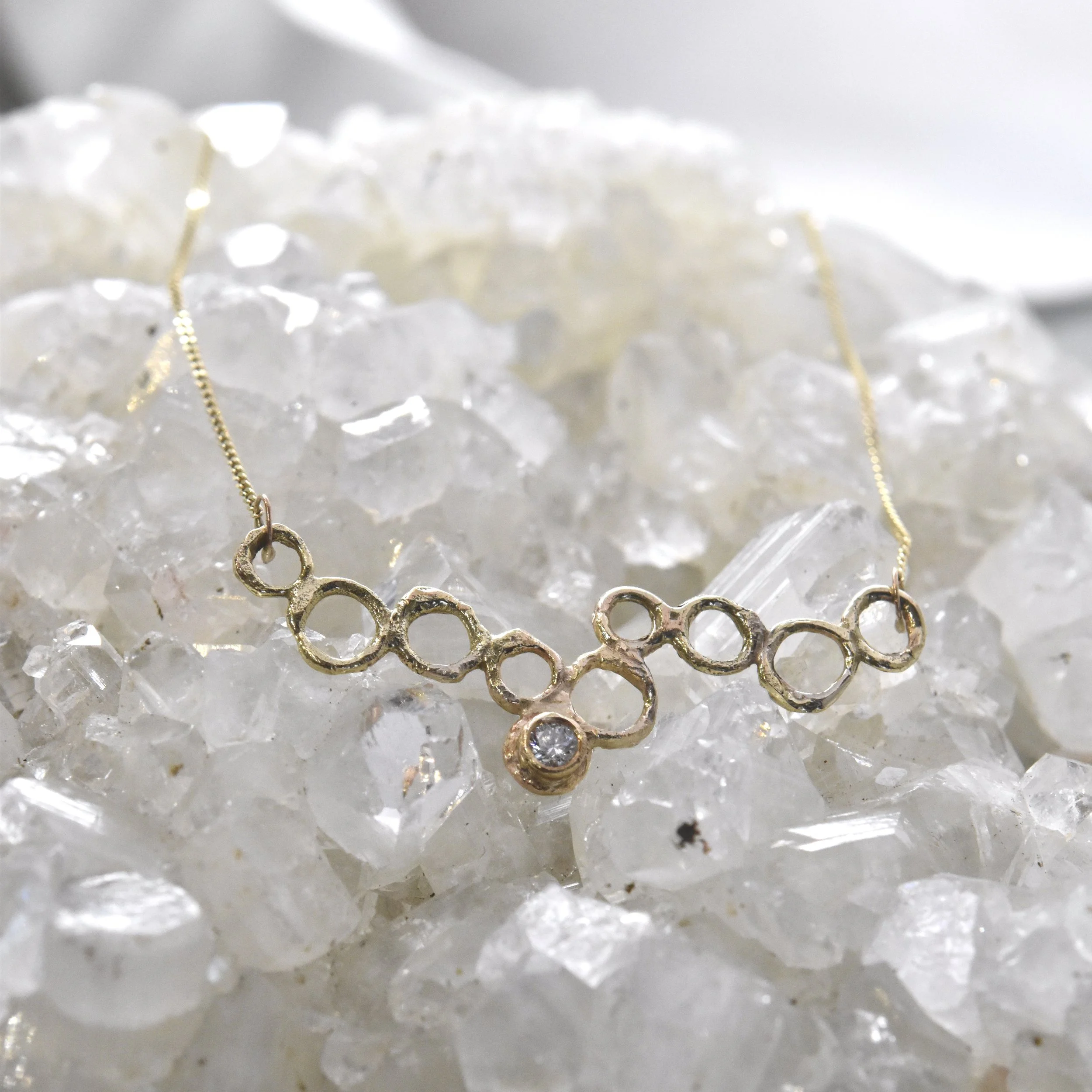 9ct yellow gold delicate chain necklace with pendant featuring 10pt 0.1ct 3mm white diamond. Handmade by Erin Cox Jewellery in Topsham, Exeter, Devon, UK.