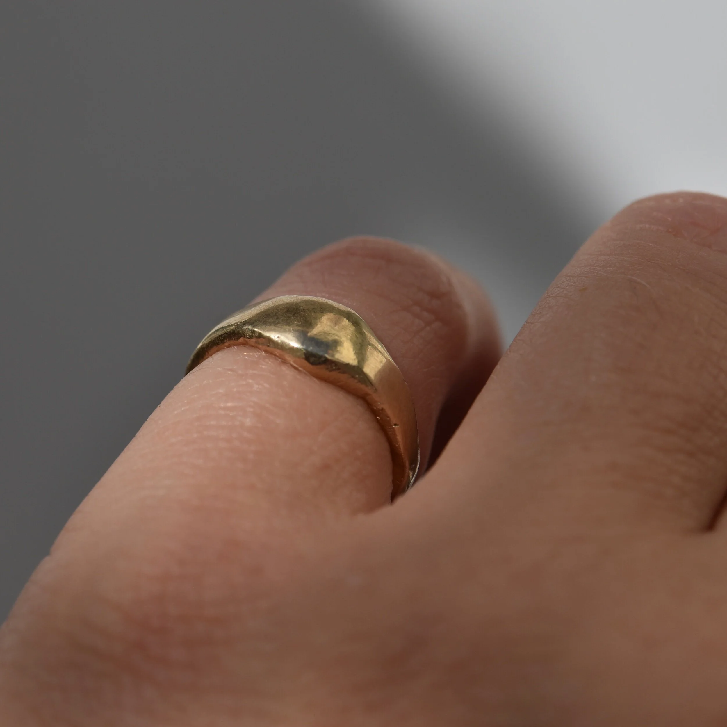 Erin Cox Molten 9ct yellow gold signet pinky ring designer handmade handcrafted jewellery recycled ethically sourced gold Uk Devon local
