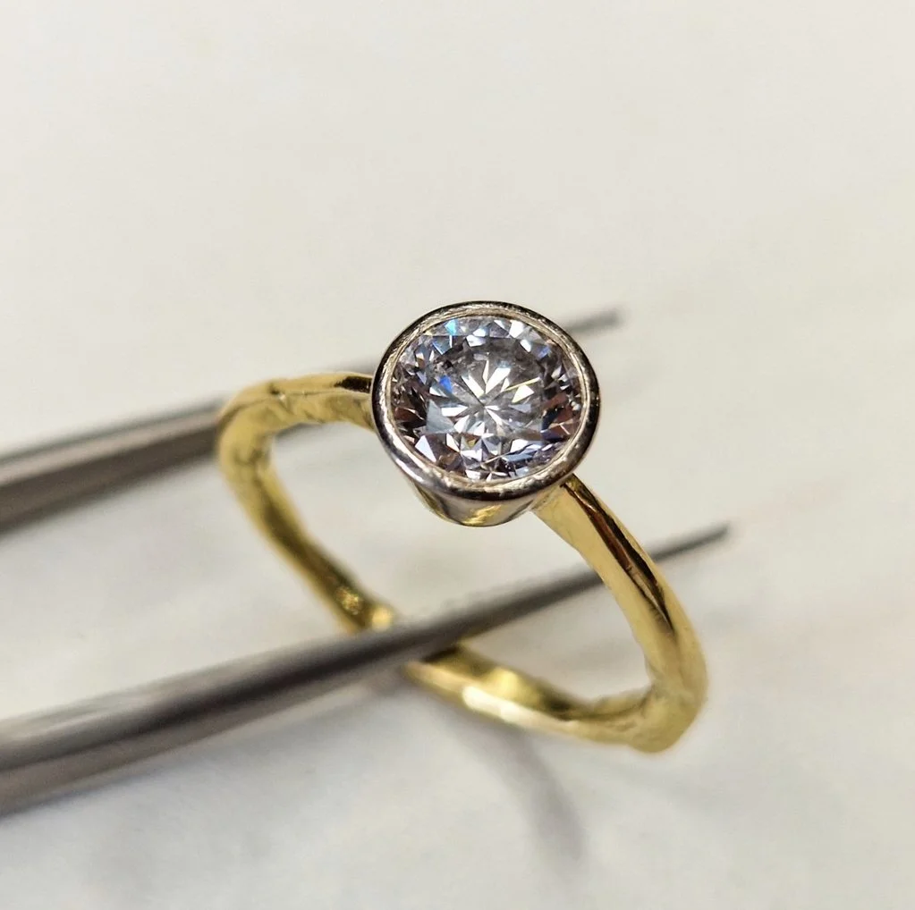 £10,800