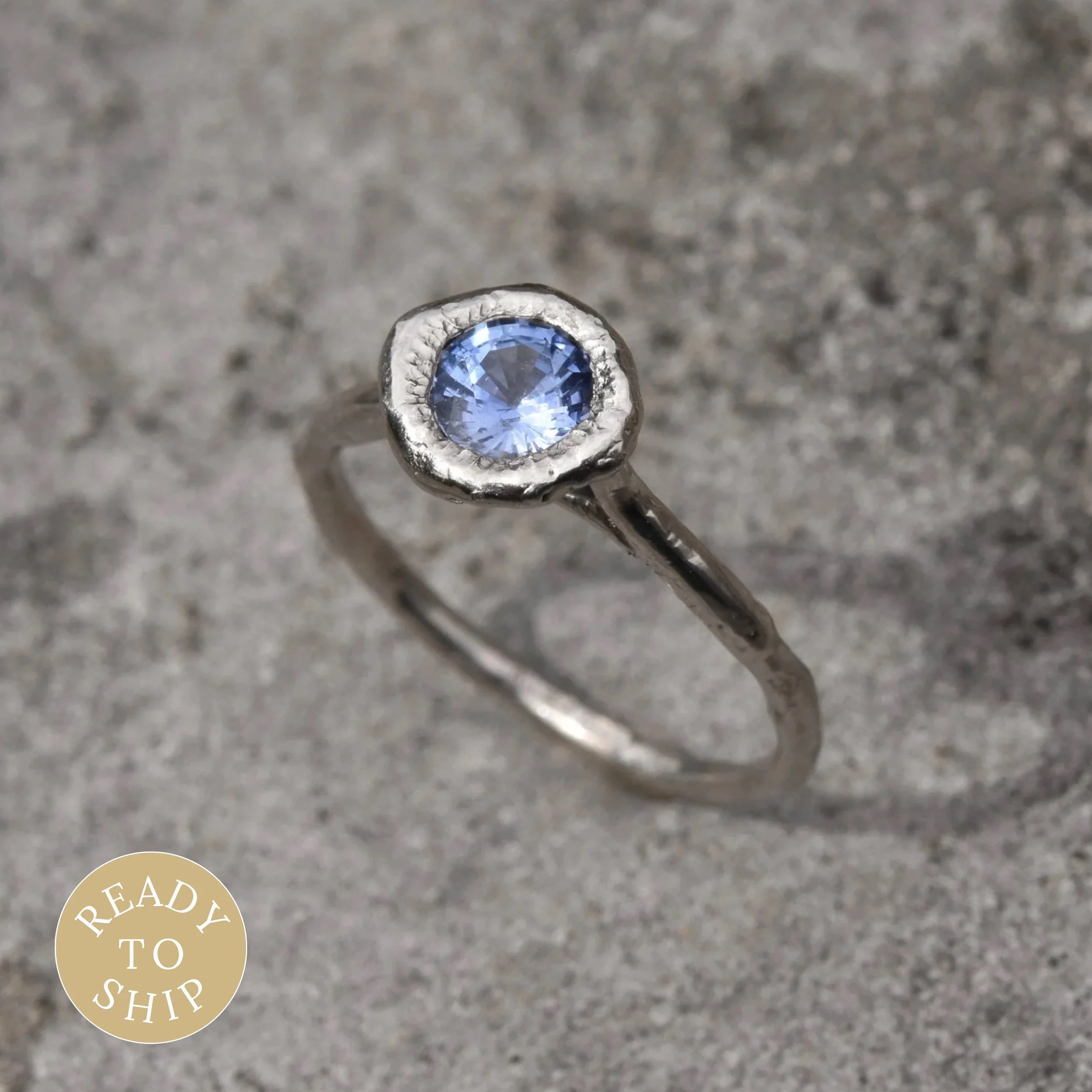 Platinum spectacle set 5mm blue sapphire molten solitaire