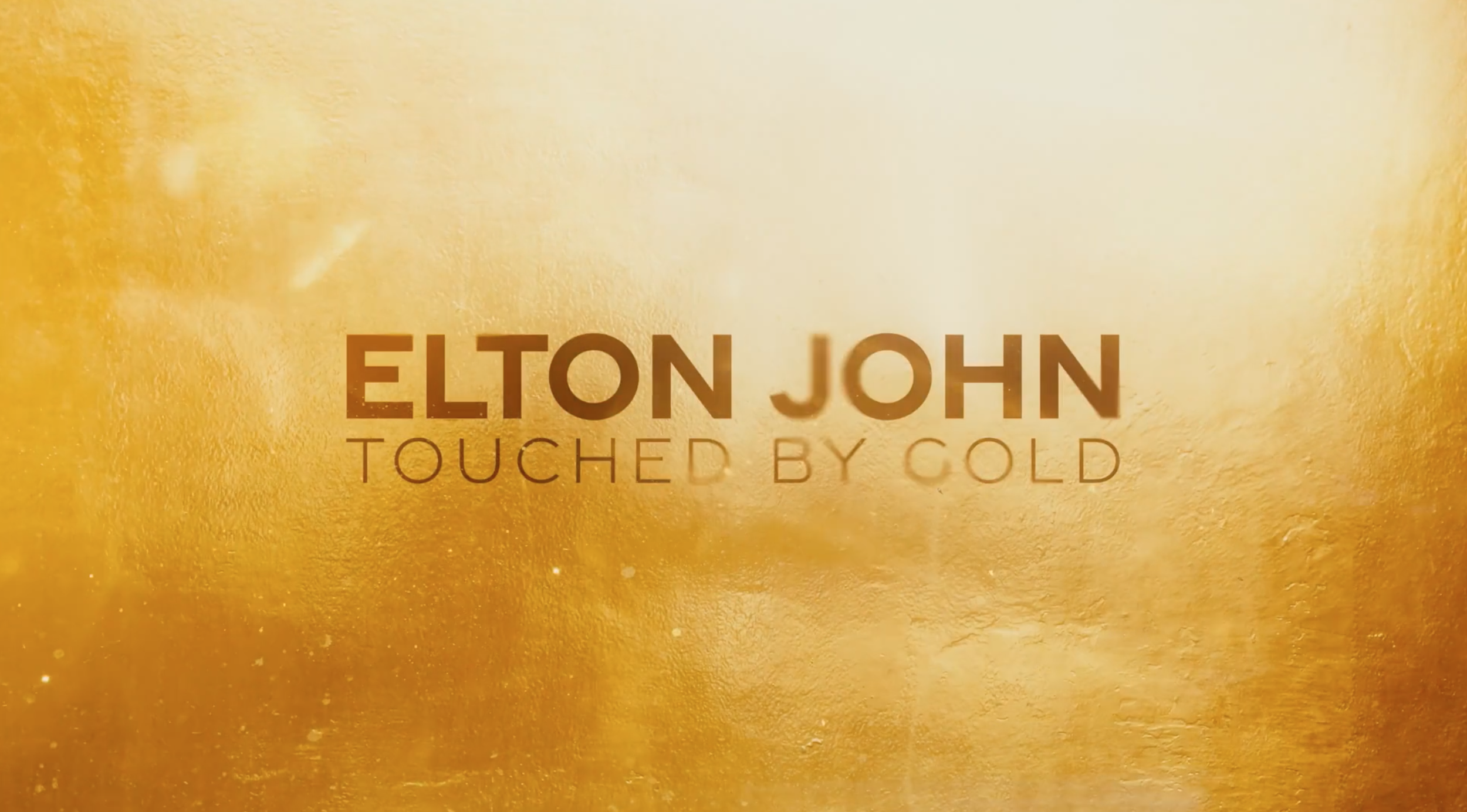ELTON JOHN TOUCHED BY GOLD