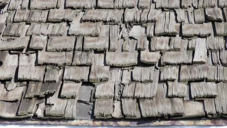 cedar-shake-shingles-worn-out-missing-shingles-on-roof.jpg