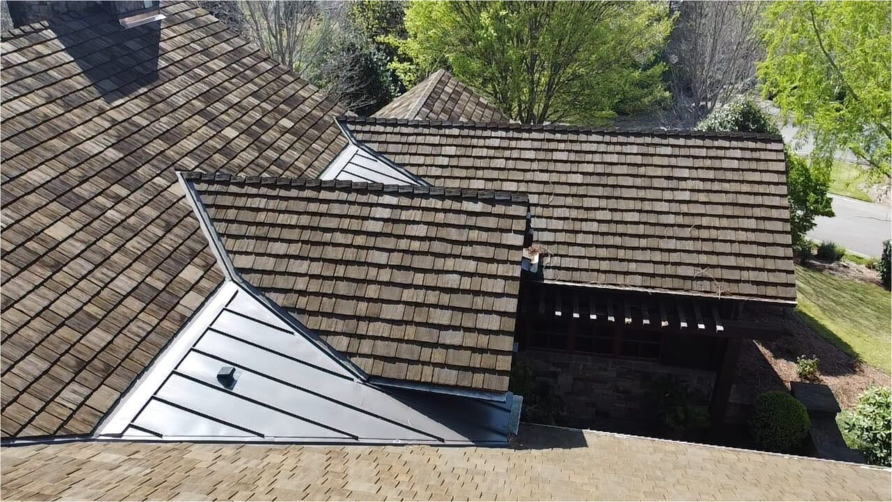 Aerial view of a CeDUR Walden synthetic shake roof on a home in South Carolina, installed by Allcon Roofing.