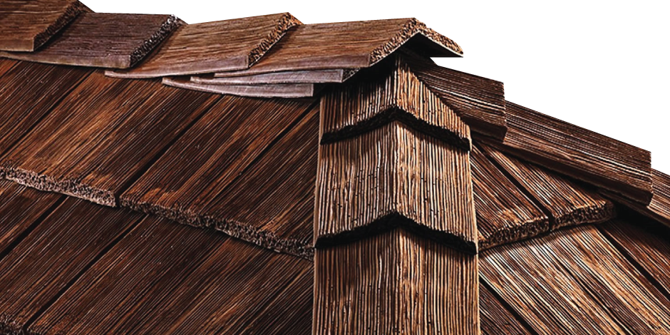 A close up picture of a roof with synthetic cedar shakes.