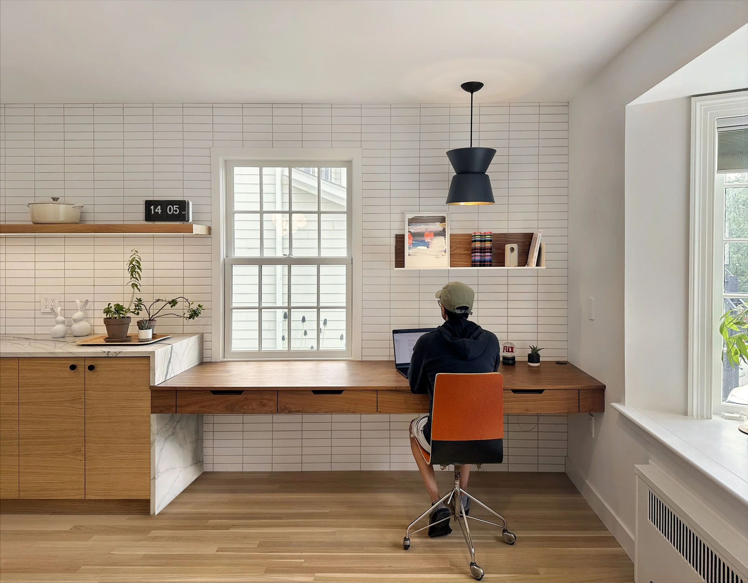  combining the old kitchen and dining rm gave us ample space -  enough for this clever  kitchen office,   where the house’s best light and vibe are. 