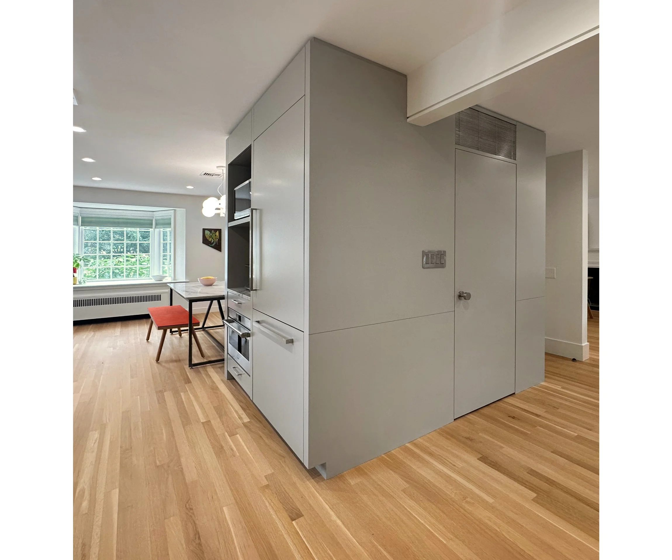  the fridge and equipment  Core  hides a walk-in pantry, that allows the spare and clean aesthetic of no kitchen wall cabinets, except where we want them in a controlled spot. 