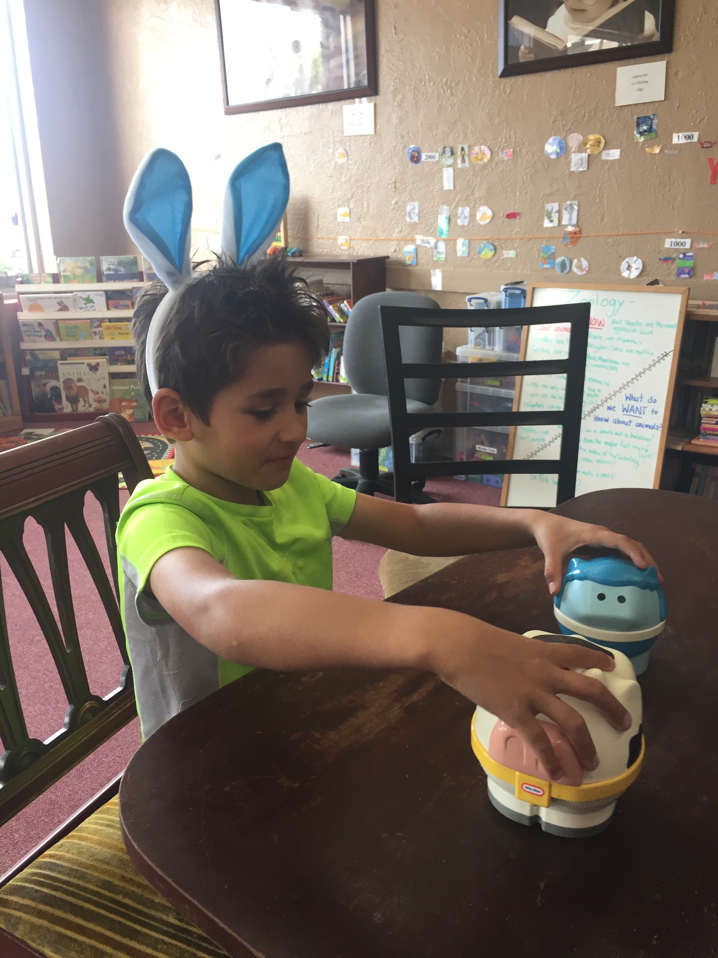 Nicolas enjoys the nesting barnyard animals