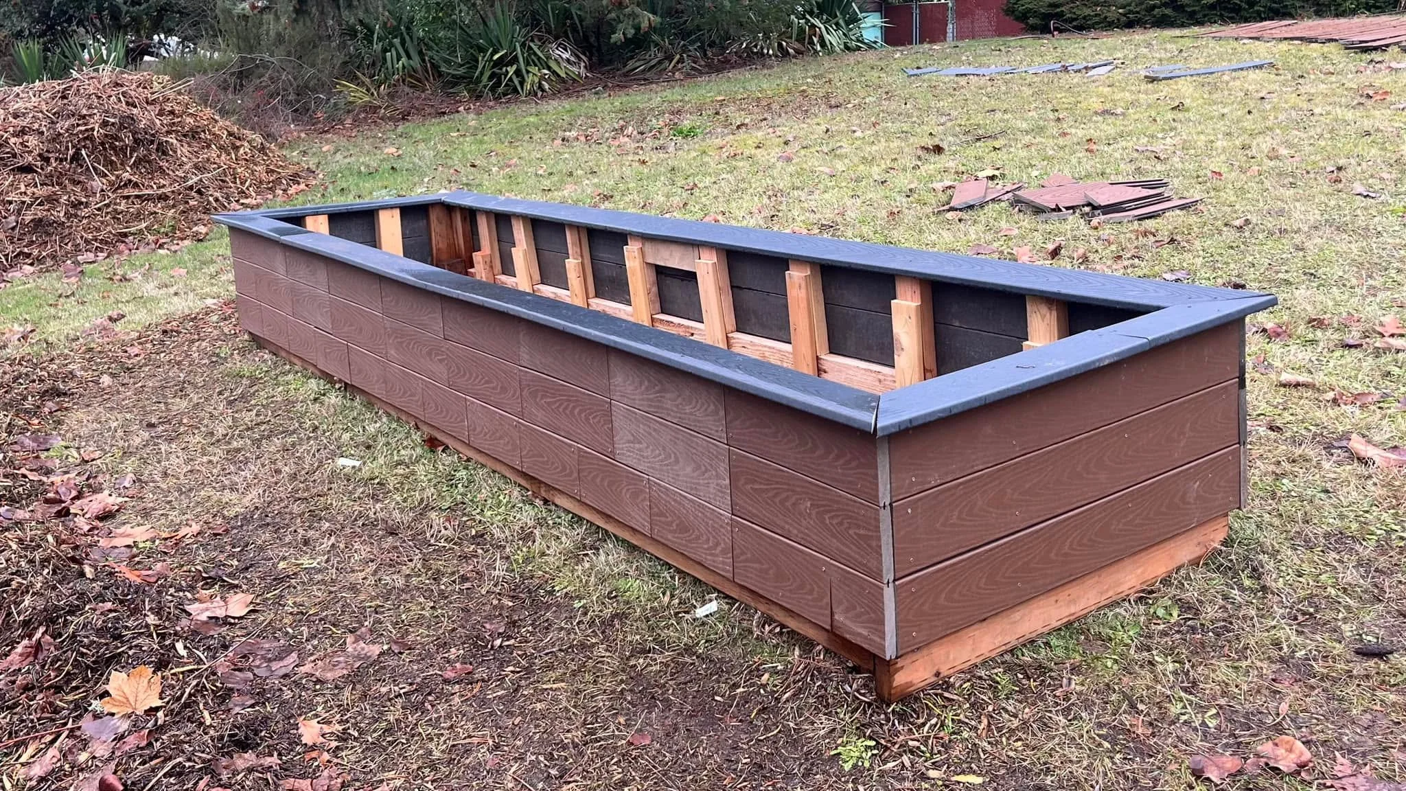 Finally finished my raised garden bed, made from mostly scrap wood, Trex, and screws left over from our deck project! I might even try to make 2 o 3 more!
