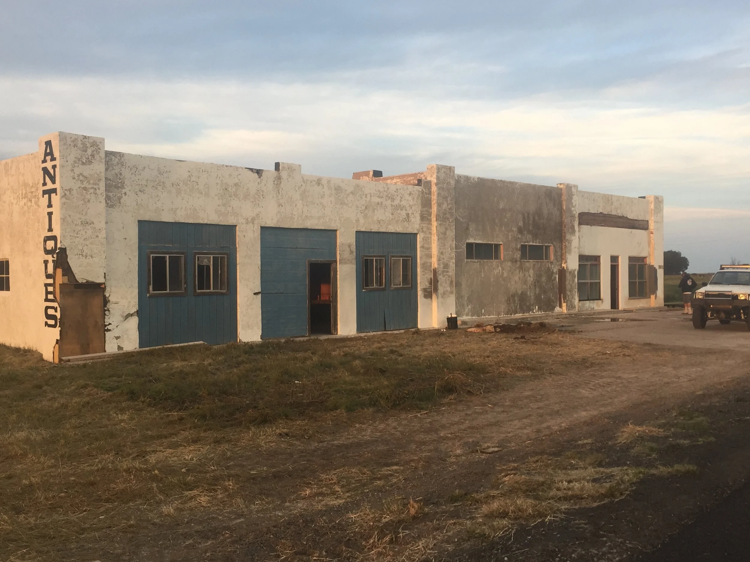  This is a good view of the design of the building. The 3 main service doors will be replaced with commercial glazing in the center and full view glass roll up service doors.  
