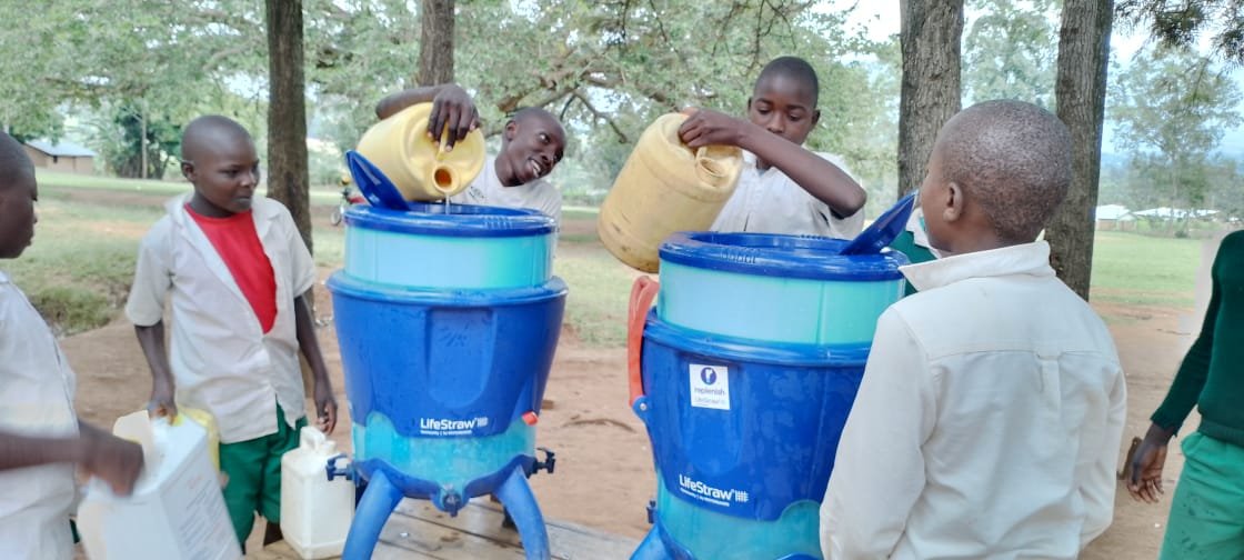 Boys filling LifeStraws-2023.jpg