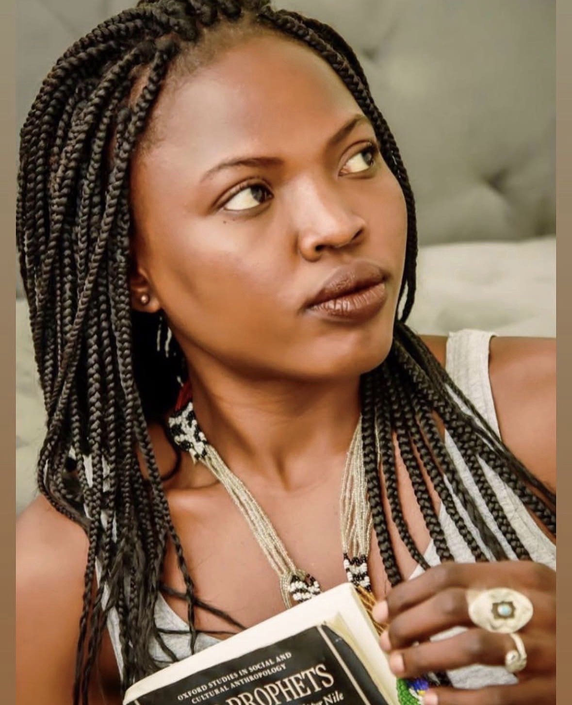  Nyamuon “Moon” Nguany Machar is a South Sudanese American spoken-word poet, documentary filmmaker, cultural advocate, and community leader who came to Maine as a refugee child. She was a writer, producer, and central subject of both  I Come From Awa