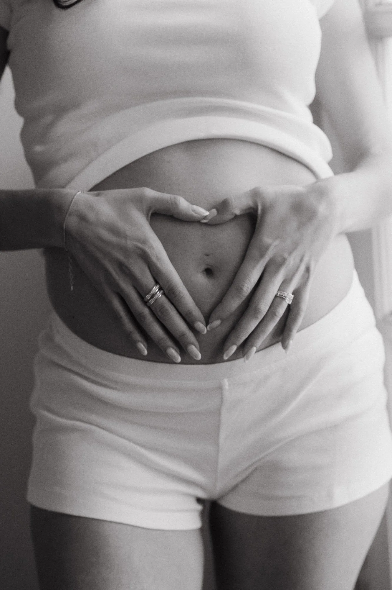 Pregnant mom during her in-home maternity session photographed in Chelsea, NYC