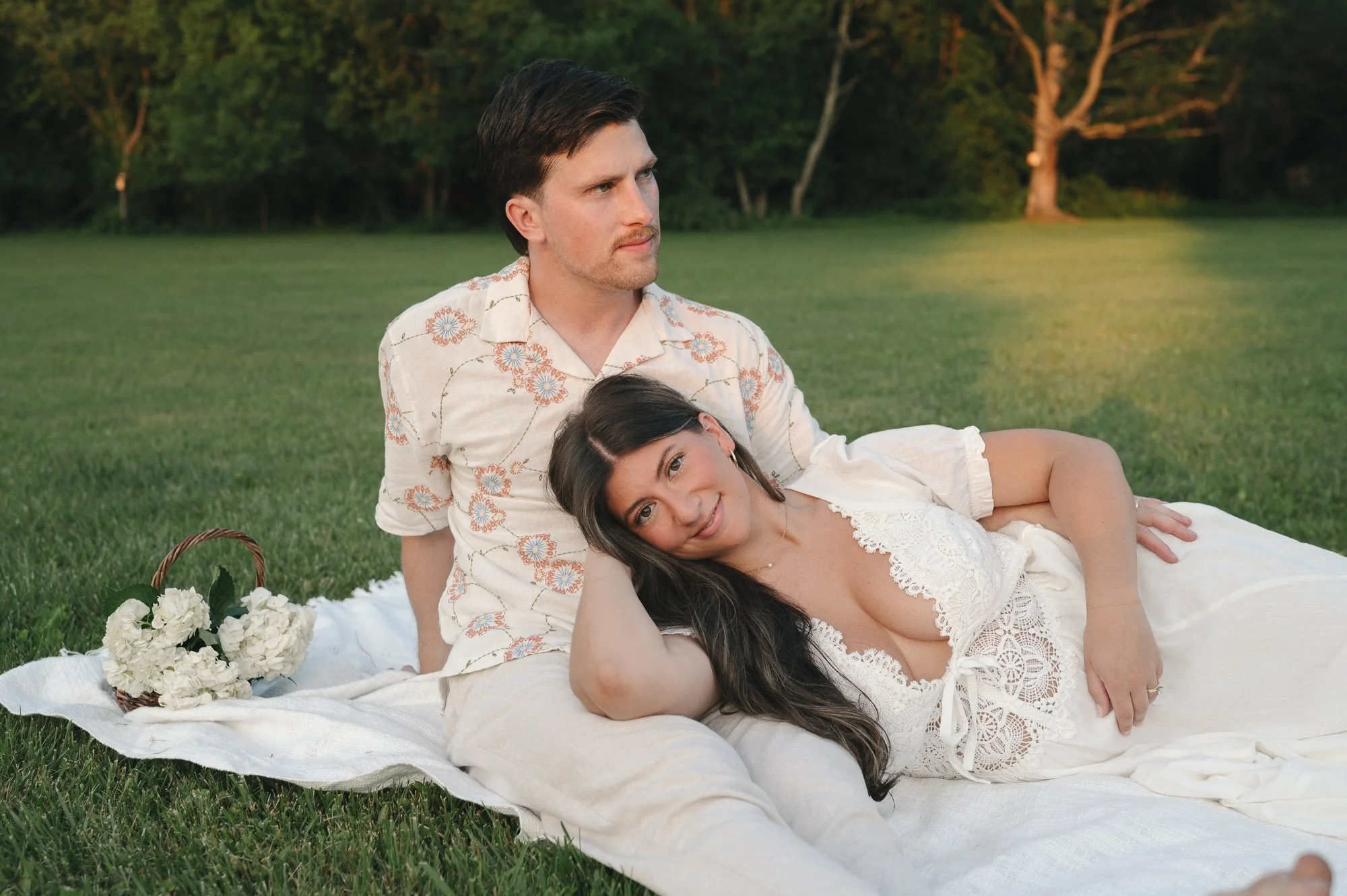 Couple posing in a maternity photoshoot for a gender reveal in Rhode Island