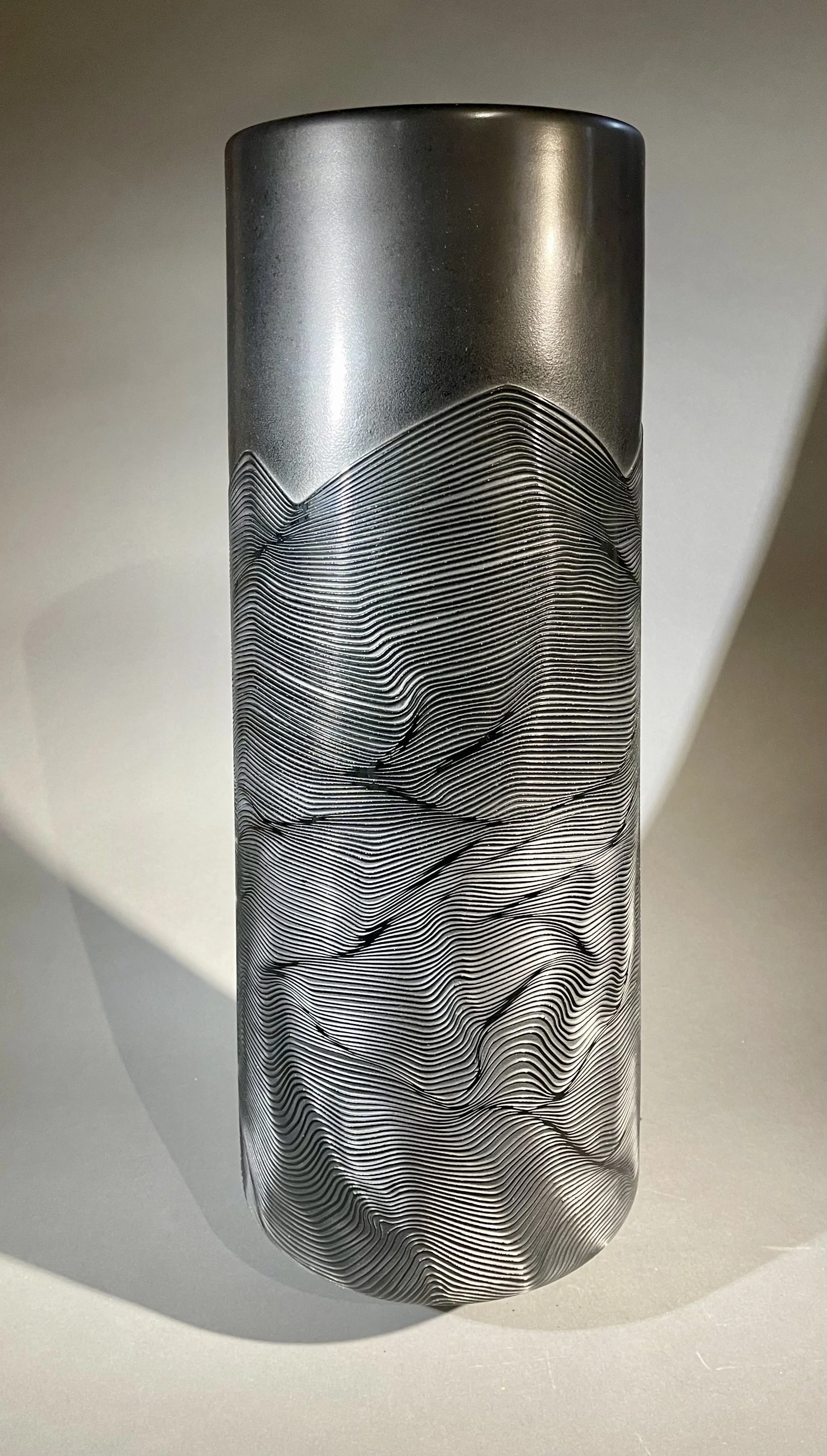 Armelle Bouchet-O’Neill, Black Mountains , Blown and Sand Carved Glass, 23.25 × 8” $4,500