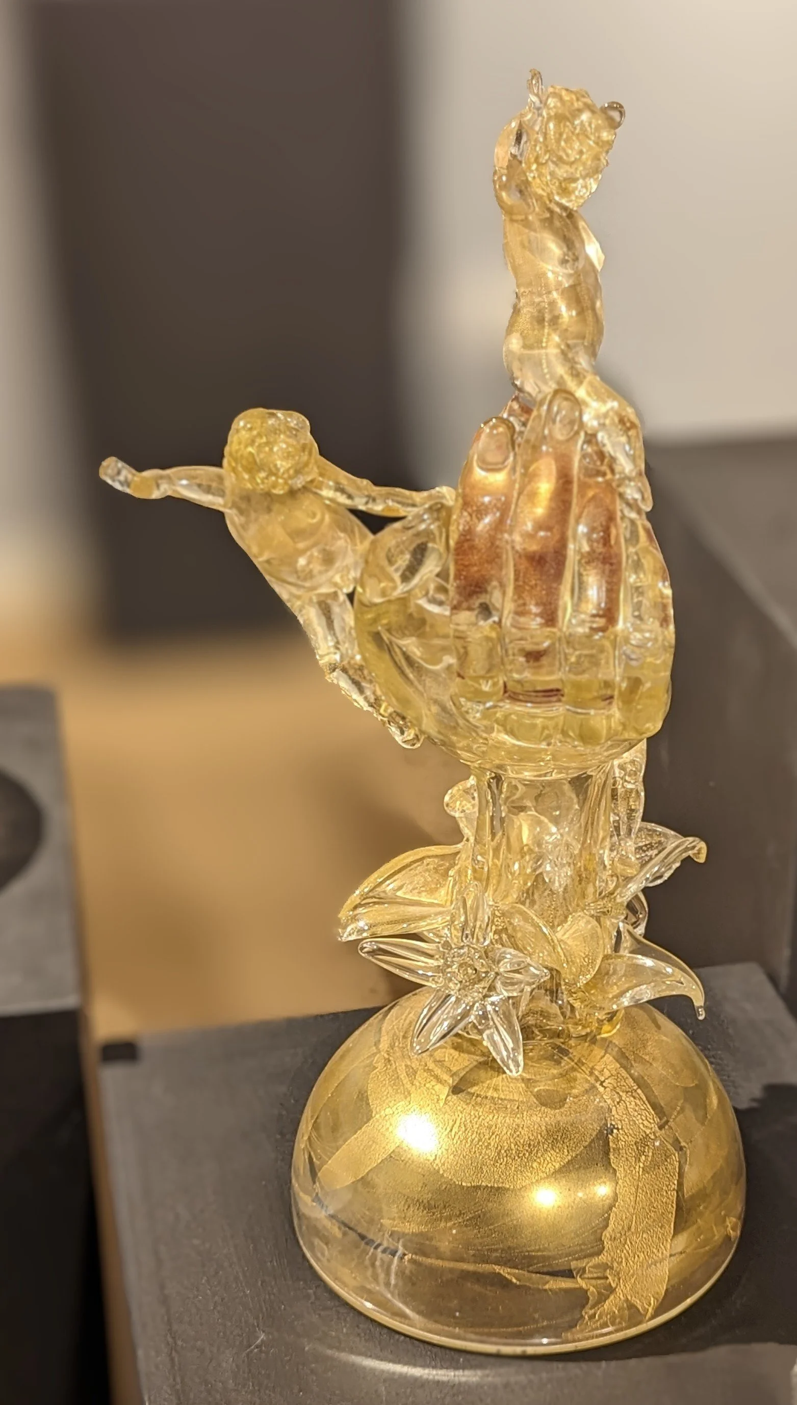 Pino Signoretto, Hand with Putti , Hot Sculpted Glass, 20 × 9 × 9” $12,500