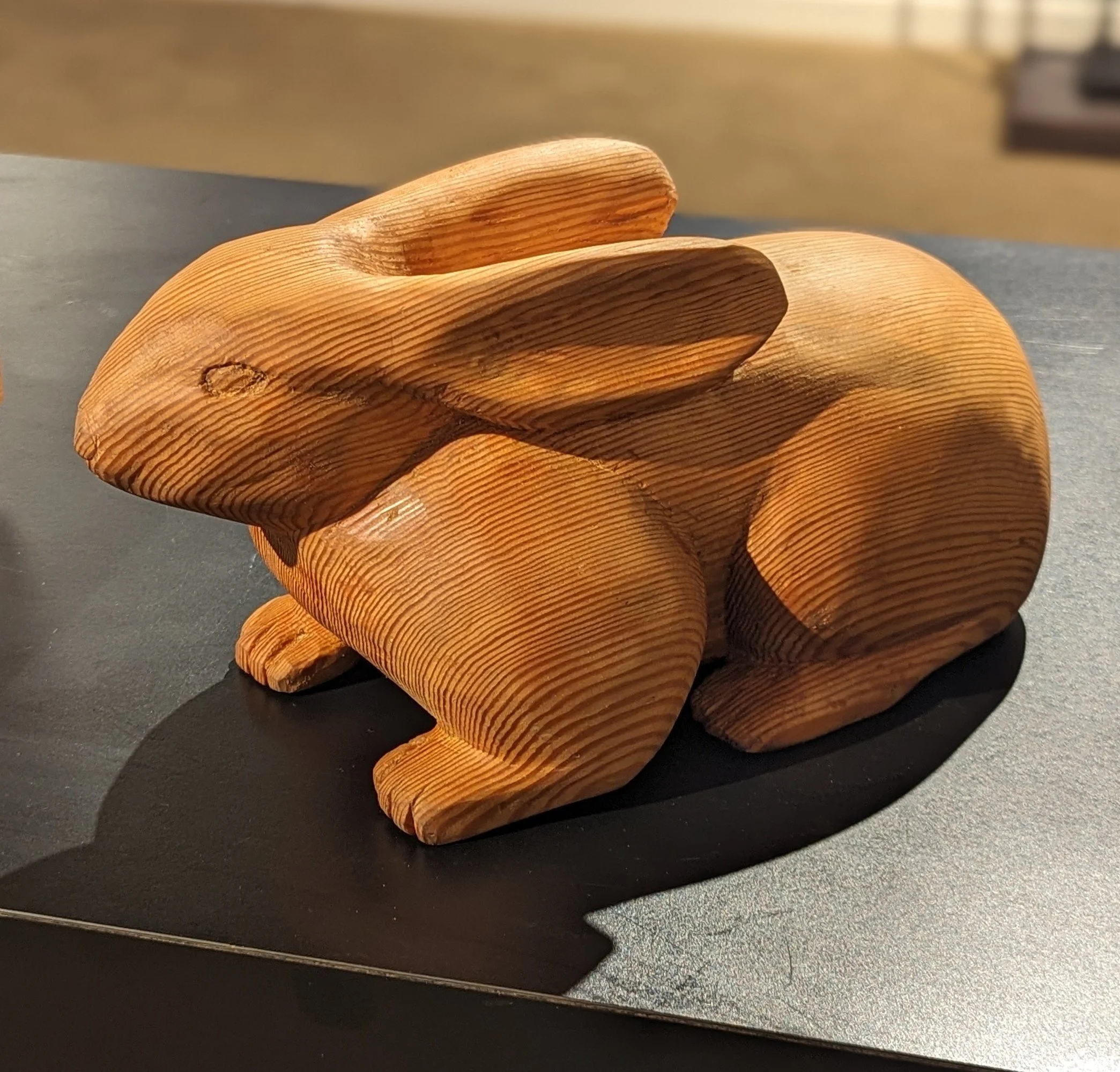   Rabbit , Tim Fowler,  Carved Wood, 7” x  7” x 15” $800 