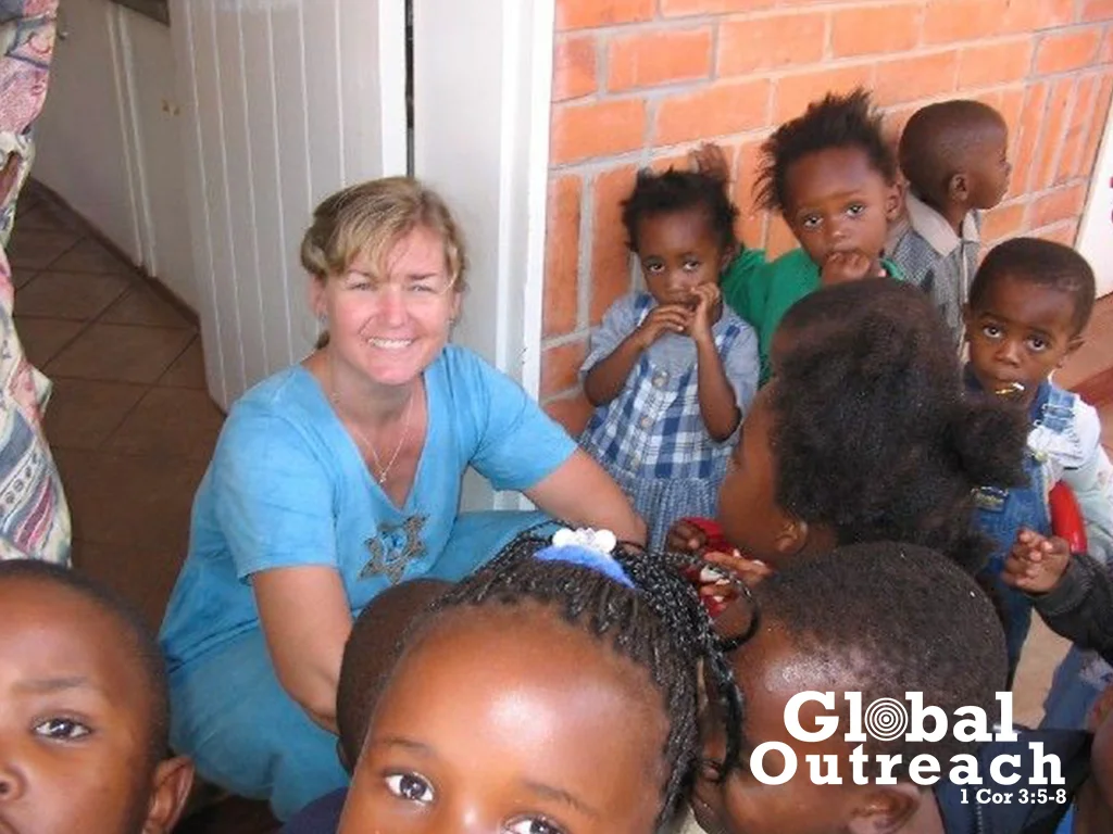 Kathy and KG kids.jpg