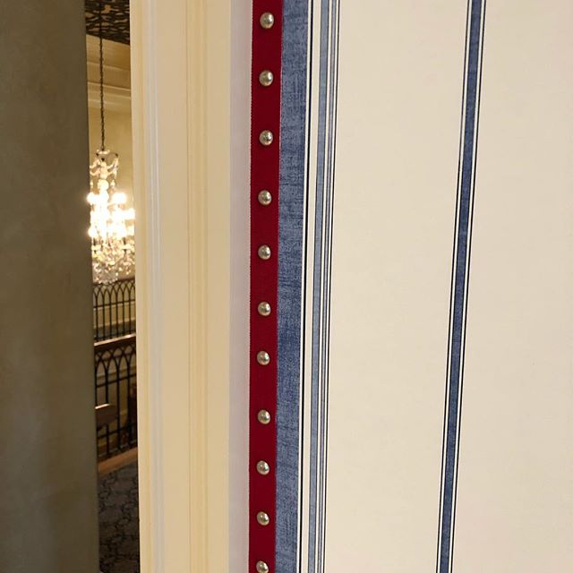 Trim detail with nailheads in a bedroom and bathroom.....looks cool! #customworkroom #atlantacustominteriors #itsallinthedetails