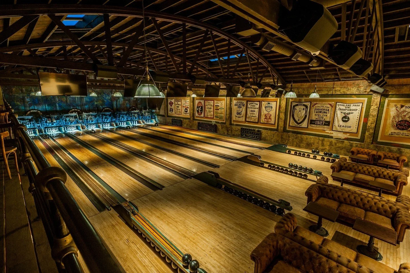A warm-lit vintage-style Highland Park bowling alley with a retro vibe.
