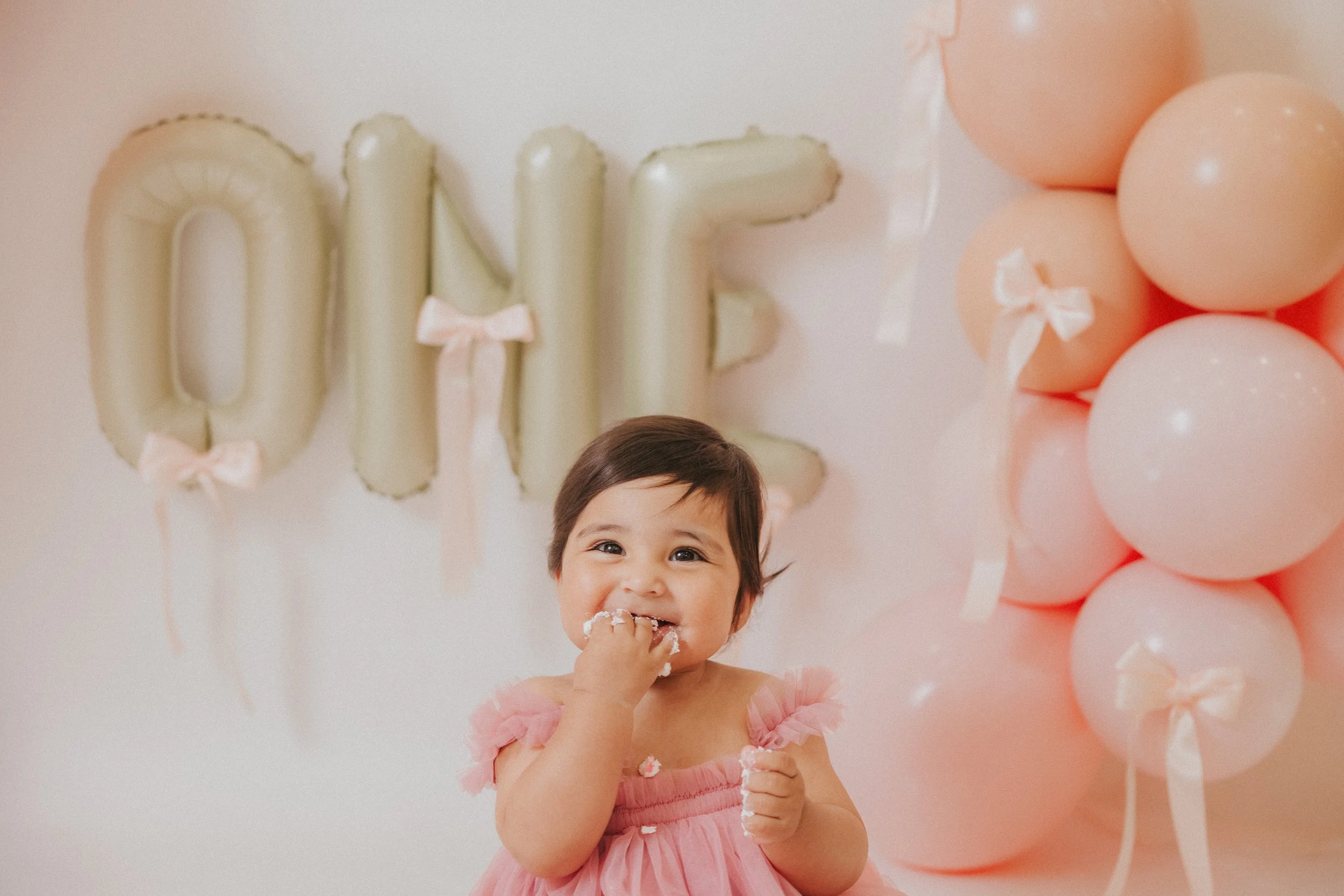 baby girl bow pastel neutral cake smash-6.jpg